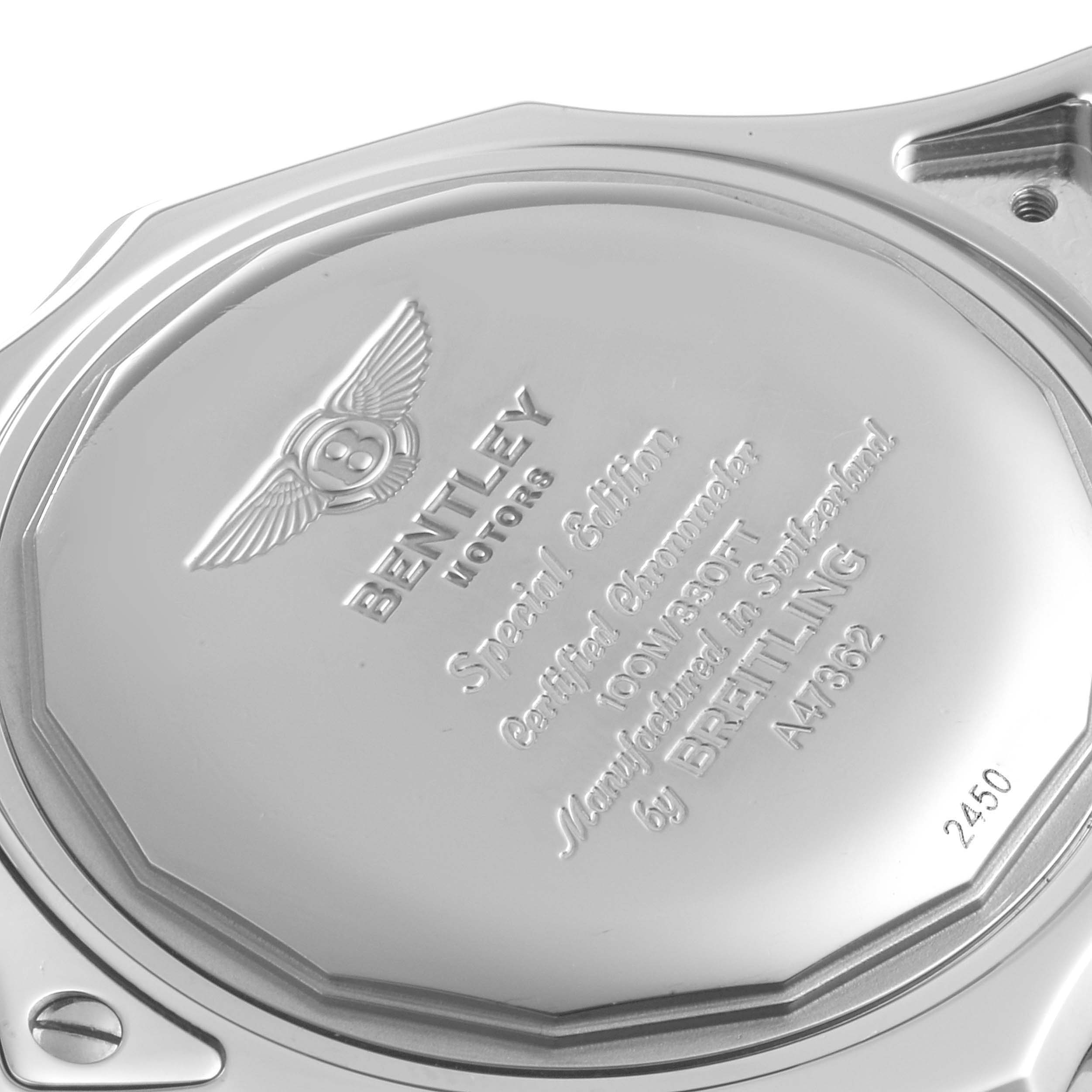 The image shows the back case of a Bentley model watch by Breitling, displaying engravings and branding.