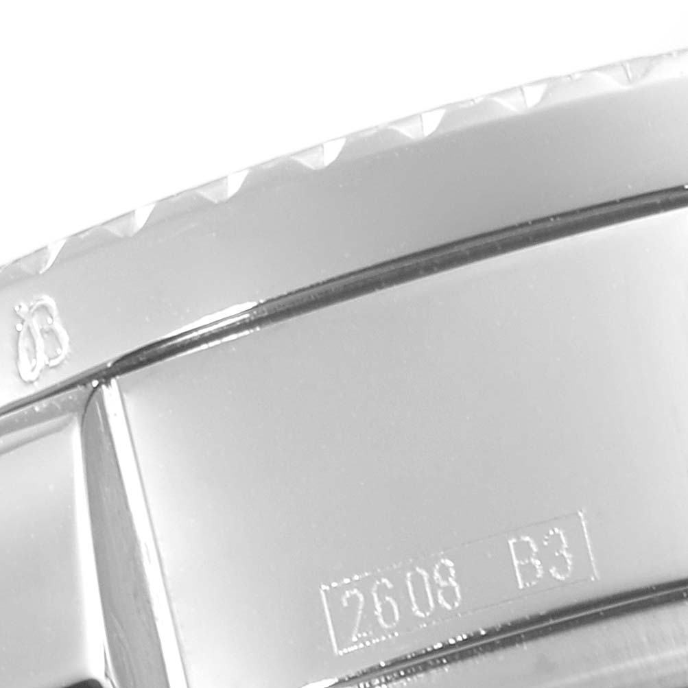 The image shows a close-up of the bezel and part of the bracelet of the Breitling Bentley A47362 Men's Stainless Steel Black Dial A47362 Men's Stainless Steel Black Dial watch.