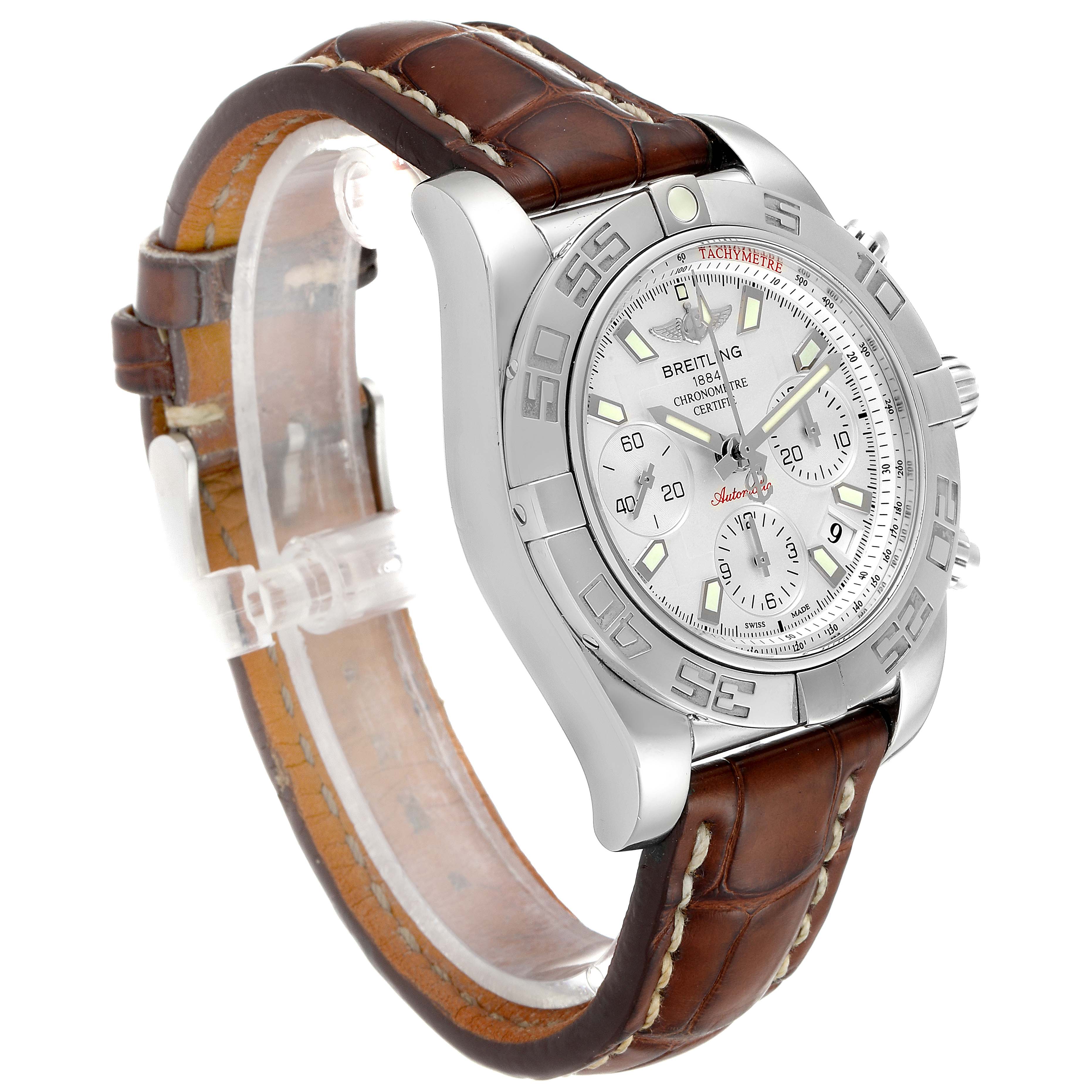 The Breitling Chronomat AB0140 Men's Stainless Steel Silver Dial AB0140 Men's Stainless Steel Silver Dial watch is shown at a slight angle, highlighting its face, brown leather strap, and stainless steel bezel.
