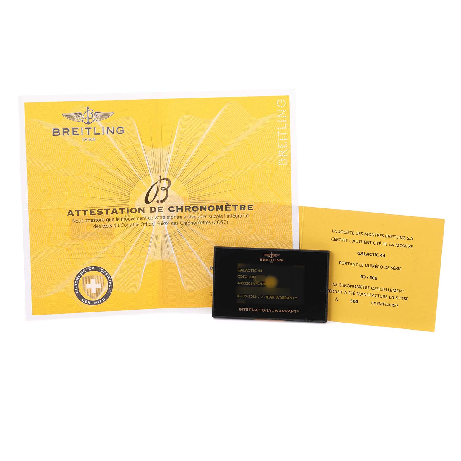 The image shows the Breitling Galactic A45320 Men's Stainless Steel Blue Dial A45320 Men's Stainless Steel Blue Dial model warranty card, certificate, and documentation, viewed from above.