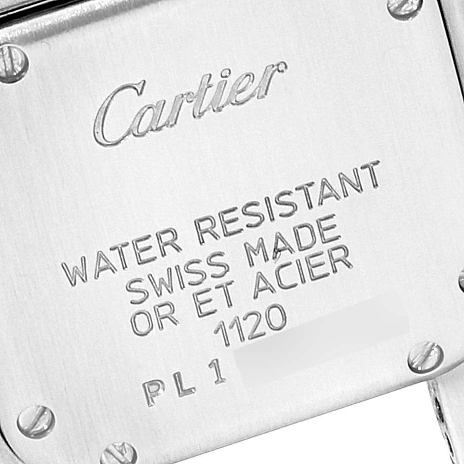 The image shows the case back of a Cartier Panthere W25029B6 Women
s Steel and Gold (two tone) Silver Dial W25029B6 Women
s Steel and Gold (two tone) Silver Dial watch, highlighting the brand name and specifications.