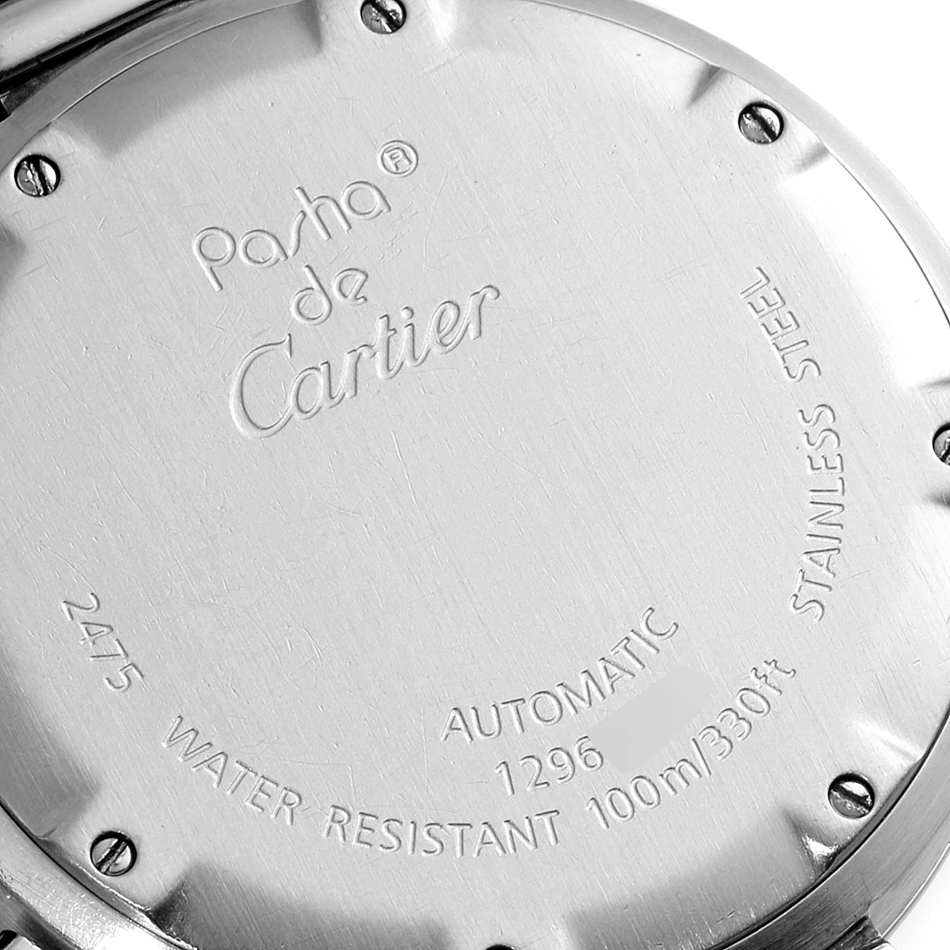 The image shows the back of a Cartier Pasha W31058M7 Men's Stainless Steel Pink Dial W31058M7 Men's Stainless Steel Pink Dial watch, displaying details about its make, model, and water resistance.