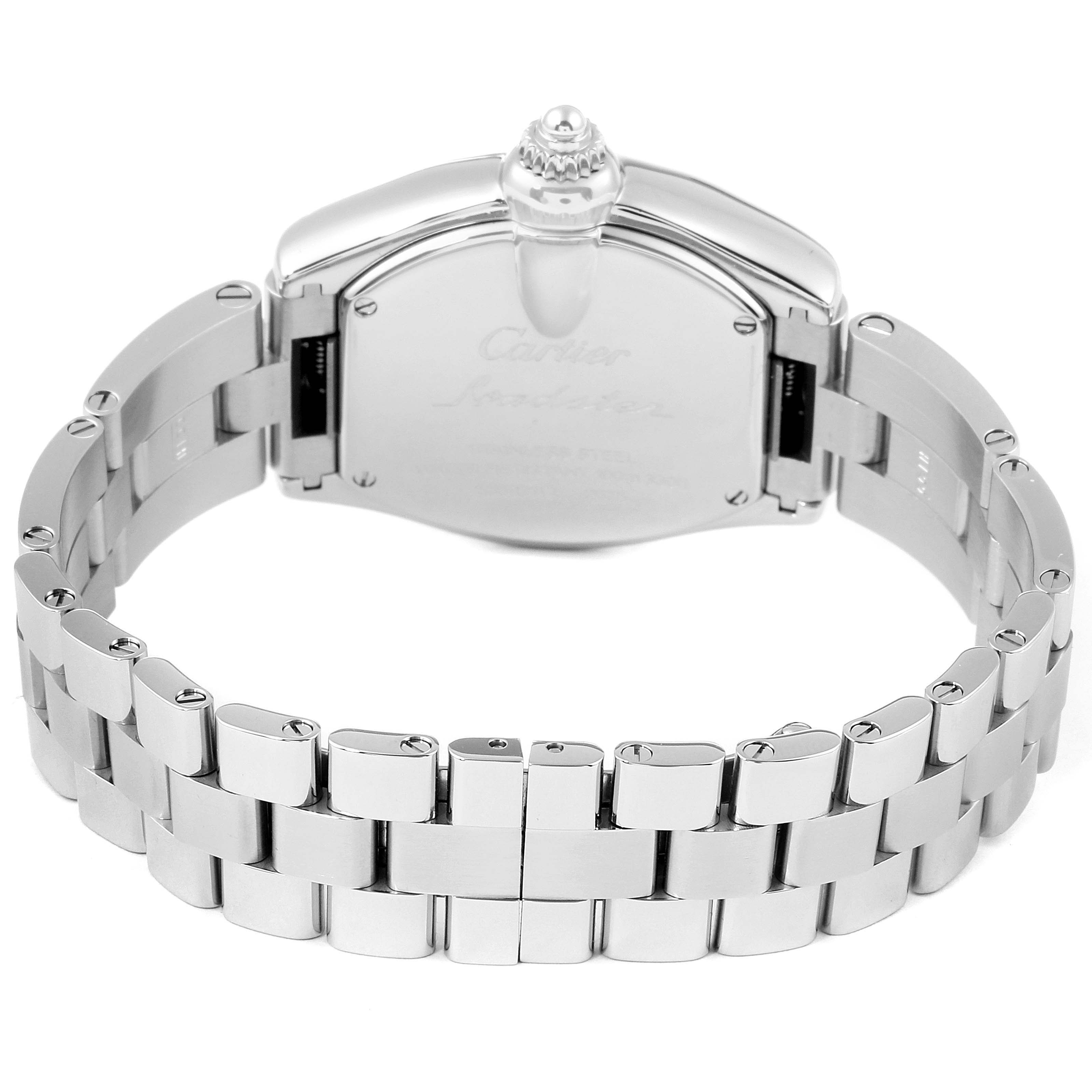 The image shows the back view of a Cartier Roadster W62016V3 Women's Stainless Steel Silver Dial W62016V3 Women's Stainless Steel Silver Dial watch, highlighting its stainless steel bracelet and closed clasp.