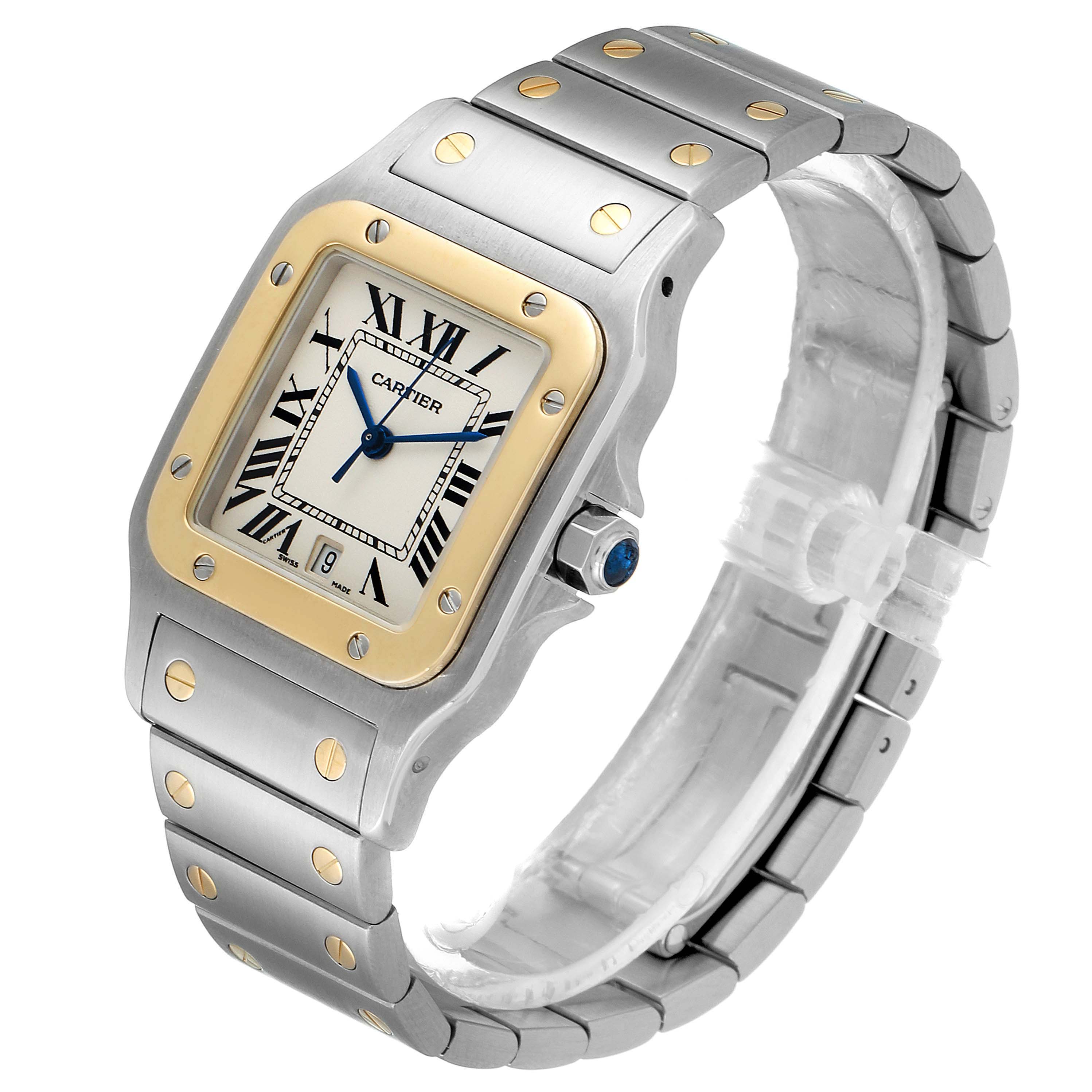 The image shows a Cartier Santos 1566 Men's Steel and Gold (two tone) Grey Dial 1566 Men's Steel and Gold (two tone) Grey Dial watch angled to display the face, bezel, crown, and bracelet.