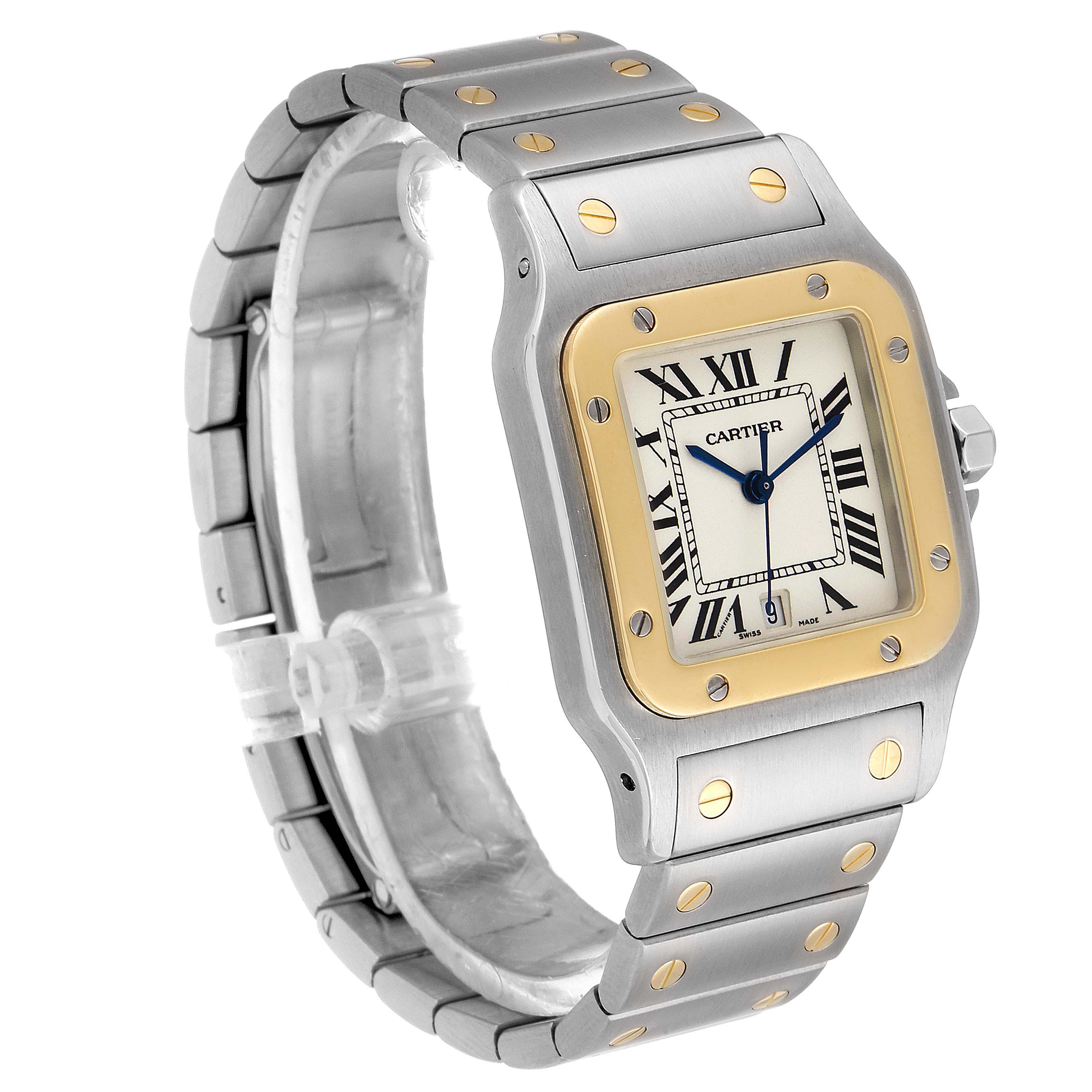 The Cartier Santos 1566 Men's Steel and Gold (two tone) Grey Dial 1566 Men's Steel and Gold (two tone) Grey Dial watch is shown at a three-quarter angle, highlighting its face, bezel, and metal bracelet.