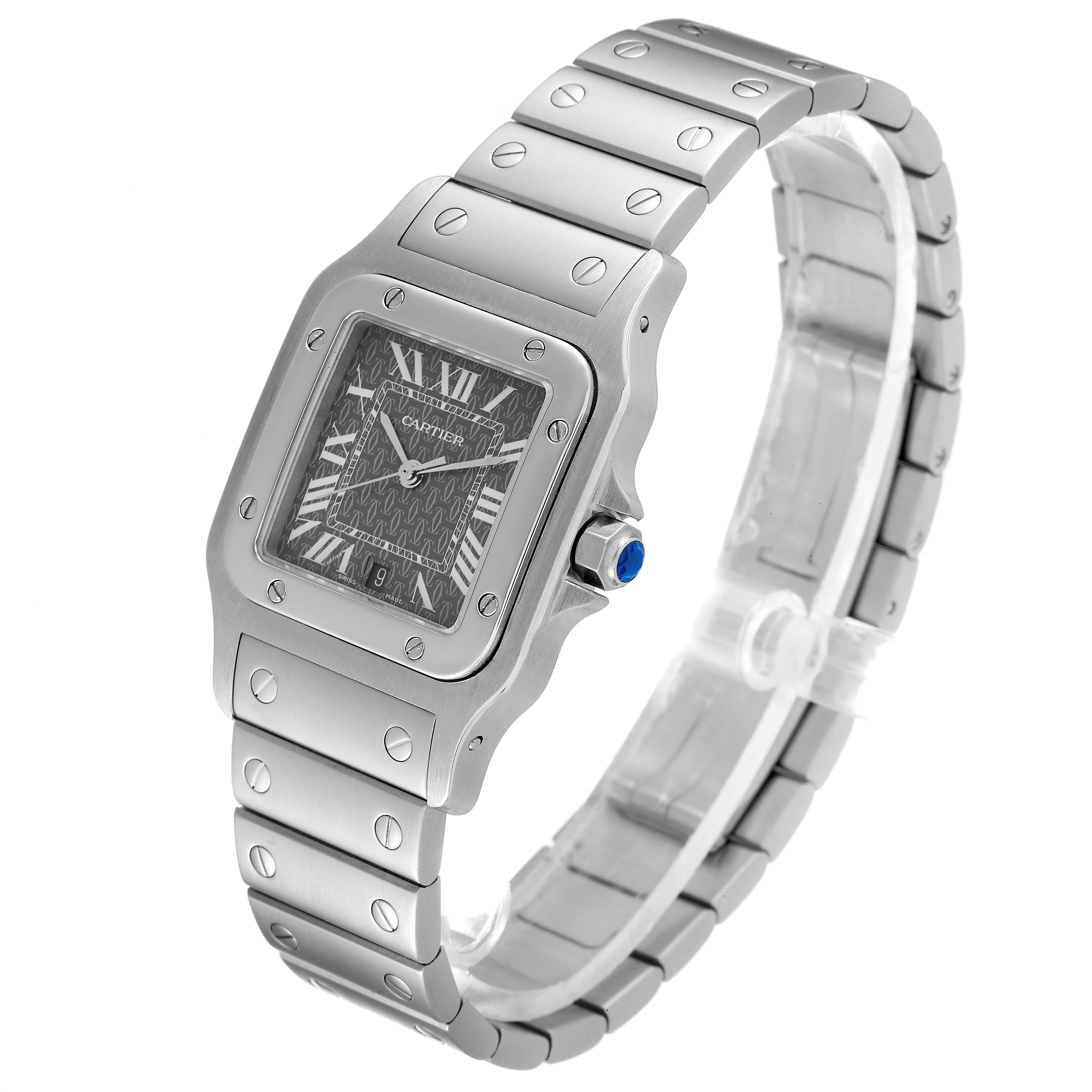 The image shows a front and side angle of the Santos model by Cartier, highlighting its steel case, bracelet, and crown with a blue gem.