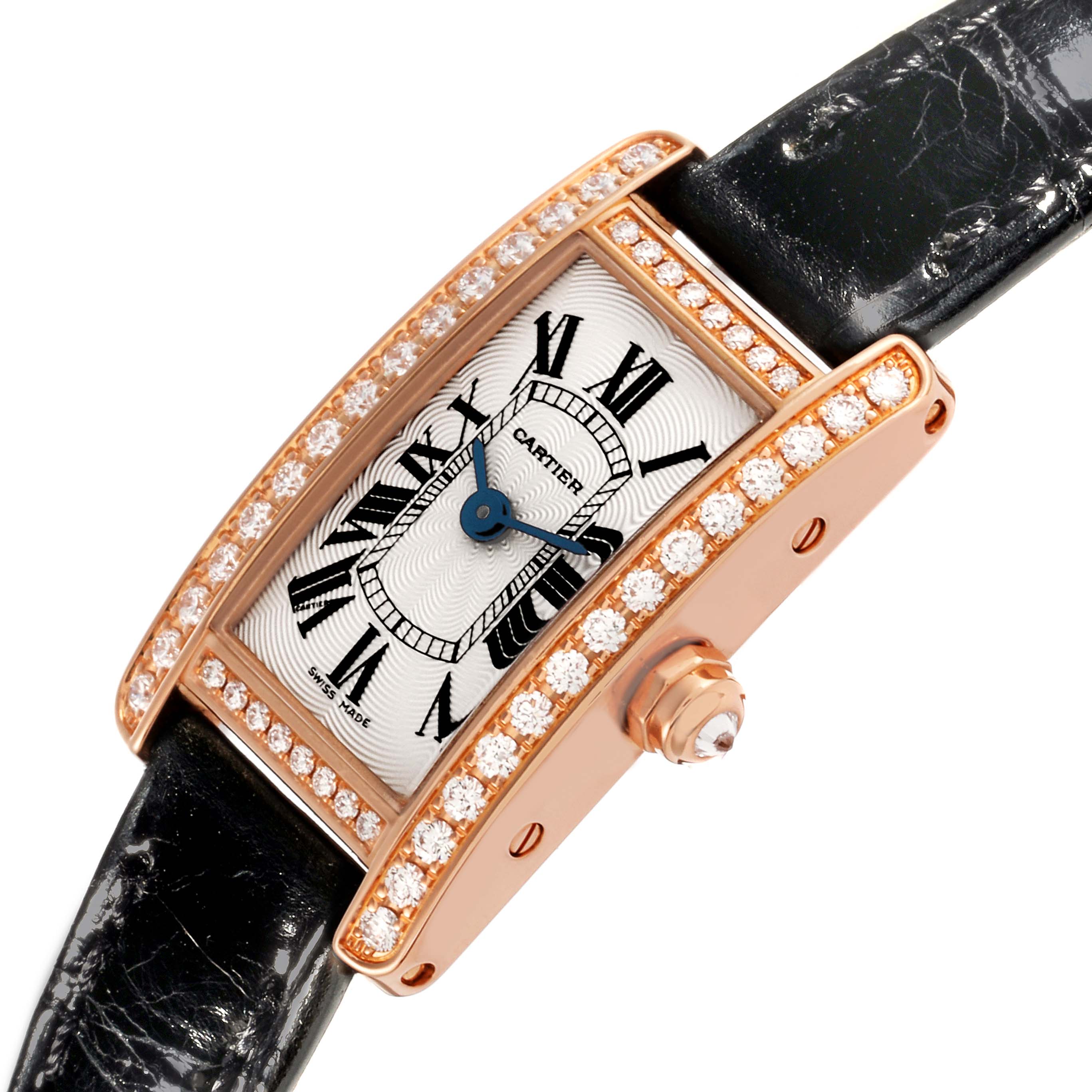 The Cartier Tank Américaine watch is shown at an angled close-up, highlighting the diamond-set case and black strap.
