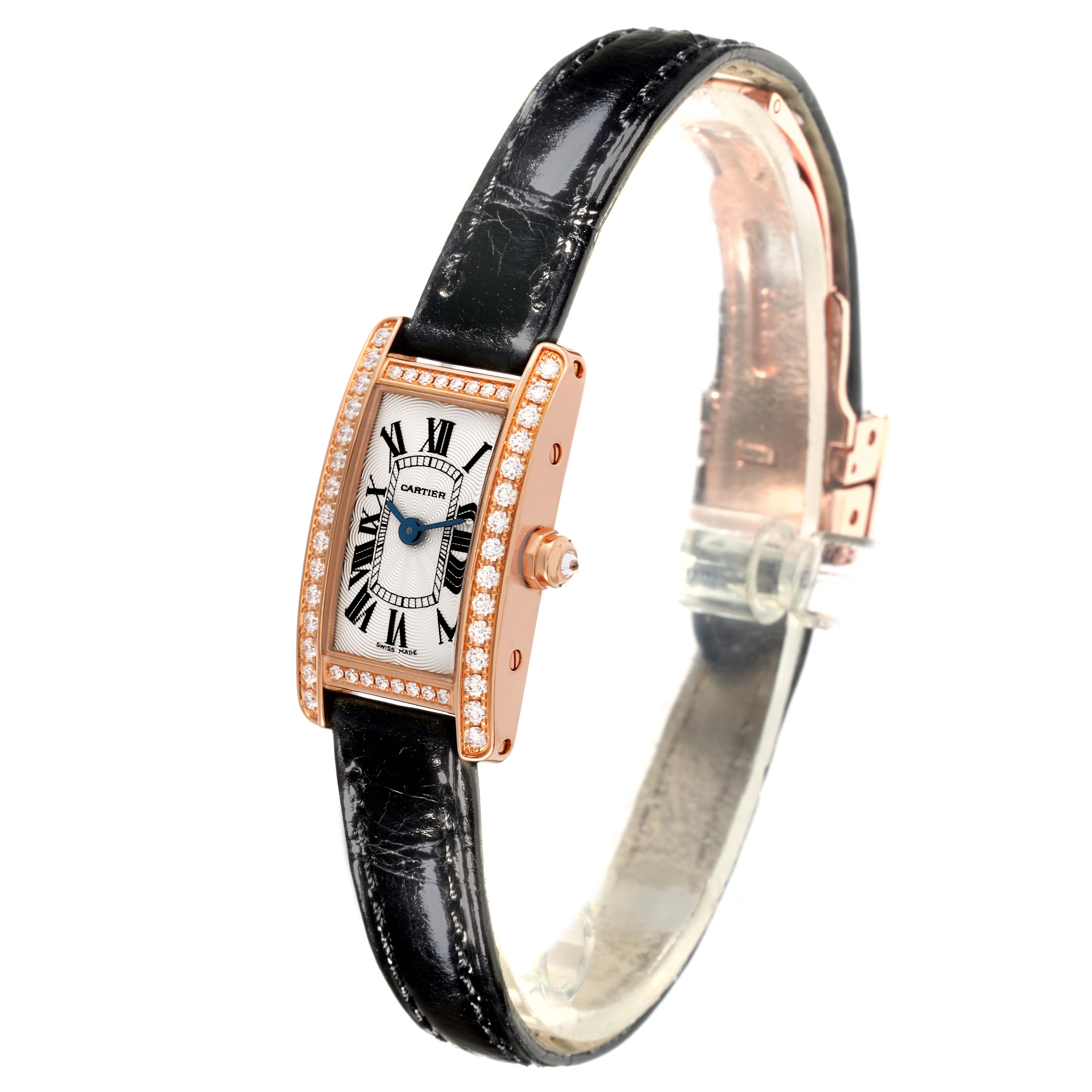 The Cartier Tank Americaine WB710014 Women's Rose Gold Silver Dial WB710014 Women's Rose Gold Silver Dial watch is shown at a slight angle, displaying the diamond-studded bezel, face, and leather strap.