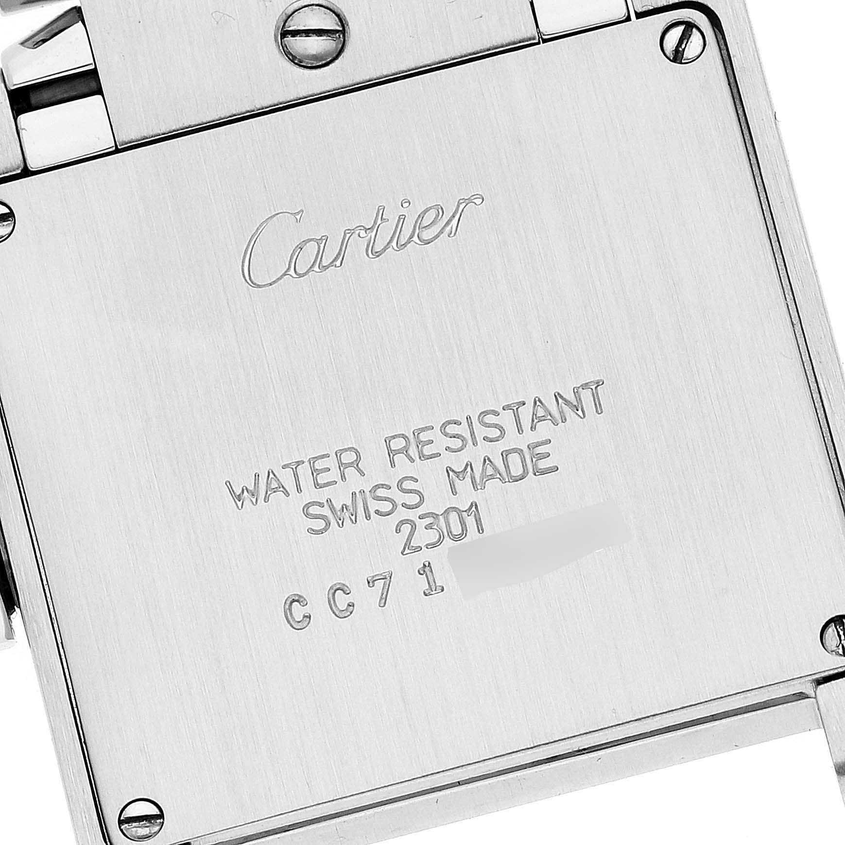 The image shows the case back of a Cartier Tank Française watch, displaying the brand name, water resistance marking, and model number.