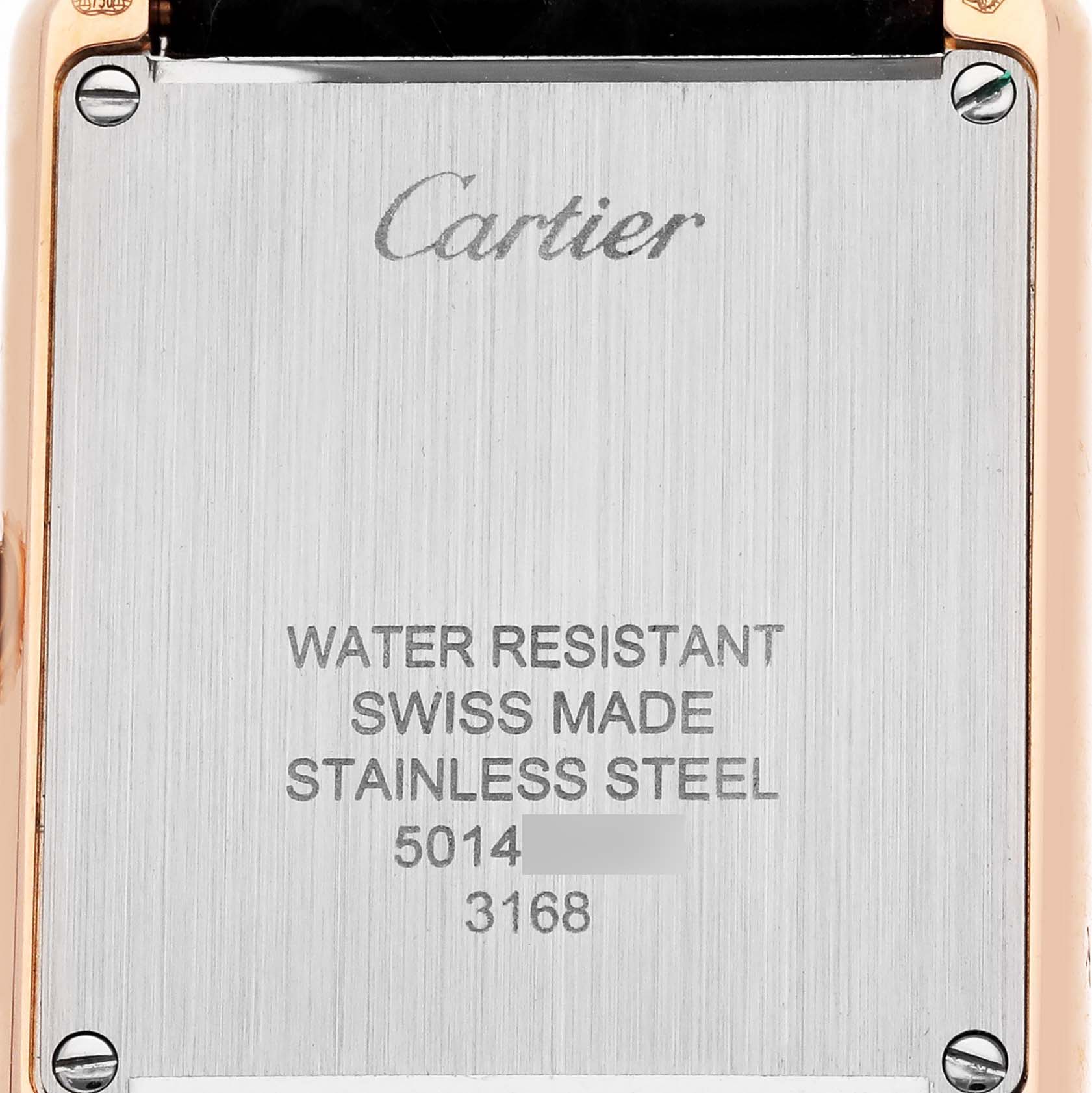 The image shows the back of a Cartier Tank Solo W5200024 Women's Steel and Gold (two tone) Silver Dial W5200024 Women's Steel and Gold (two tone) Silver Dial watch, featuring text detailing water resistance and materials.