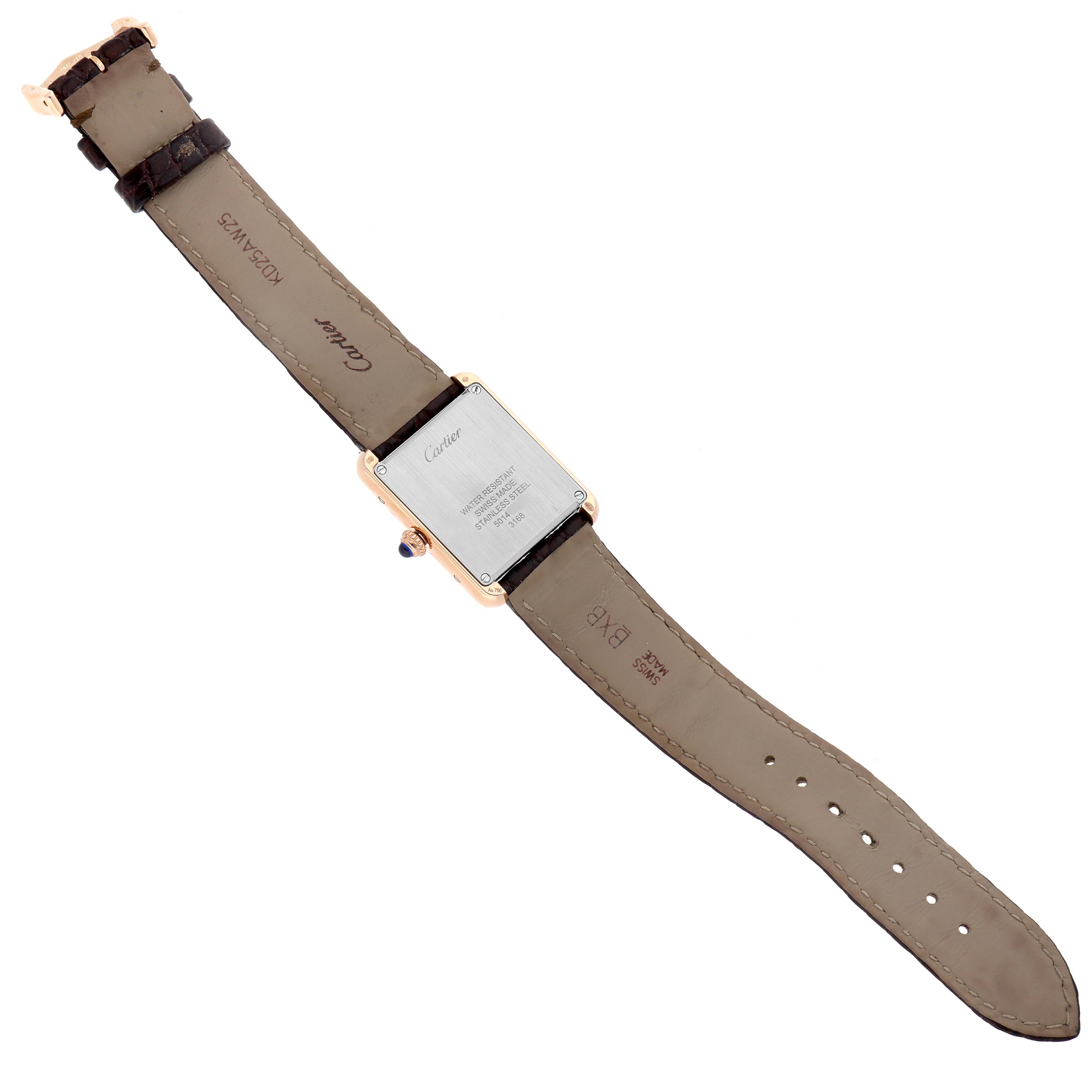 The image shows the back view of a Cartier Tank Solo W5200024 Women's Steel and Gold (two tone) Silver Dial W5200024 Women's Steel and Gold (two tone) Silver Dial watch, displaying the case and leather straps.