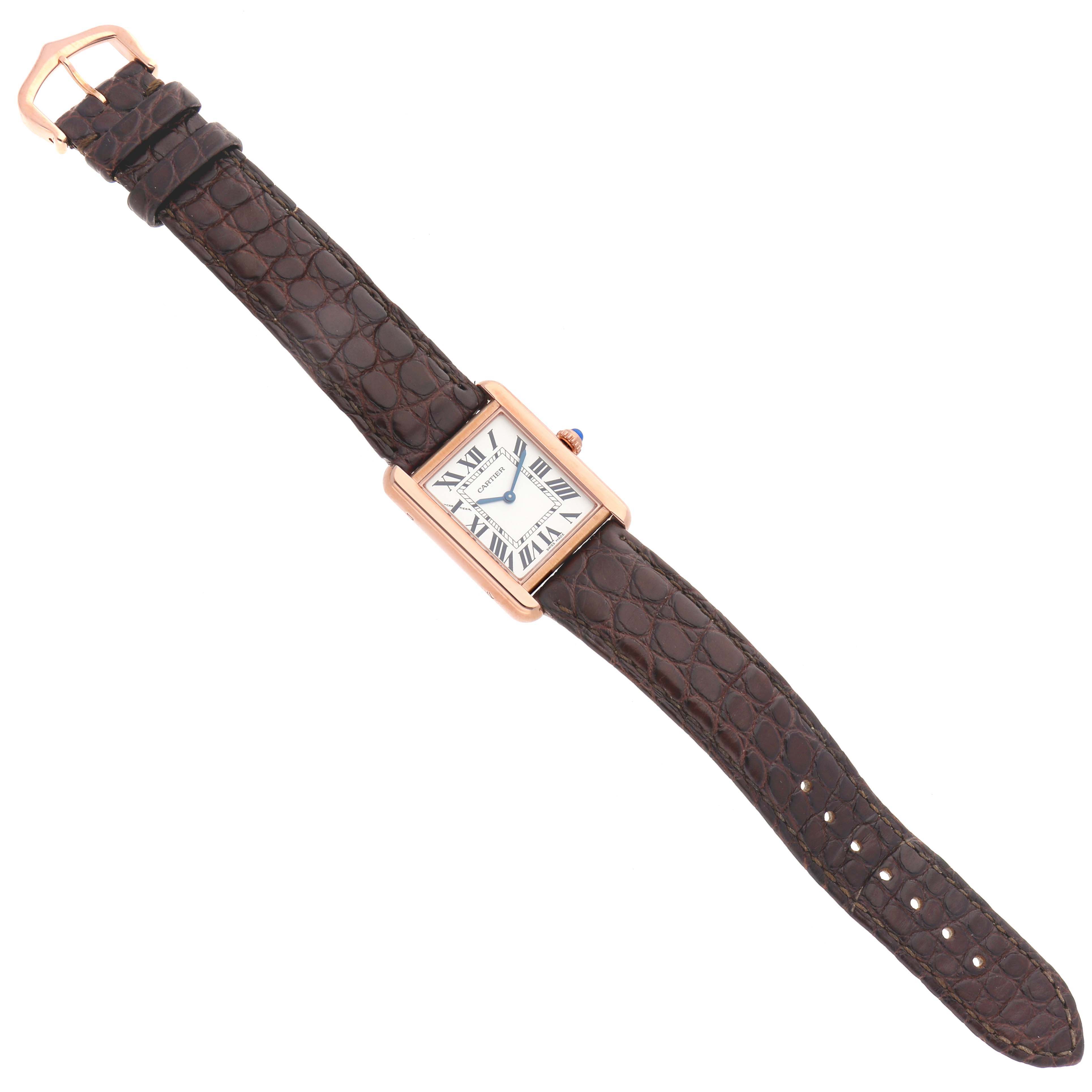 The Cartier Tank Solo W5200024 Women's Steel and Gold (two tone) Silver Dial W5200024 Women's Steel and Gold (two tone) Silver Dial watch is shown from a top-down angle, displaying the face, strap, and buckle.