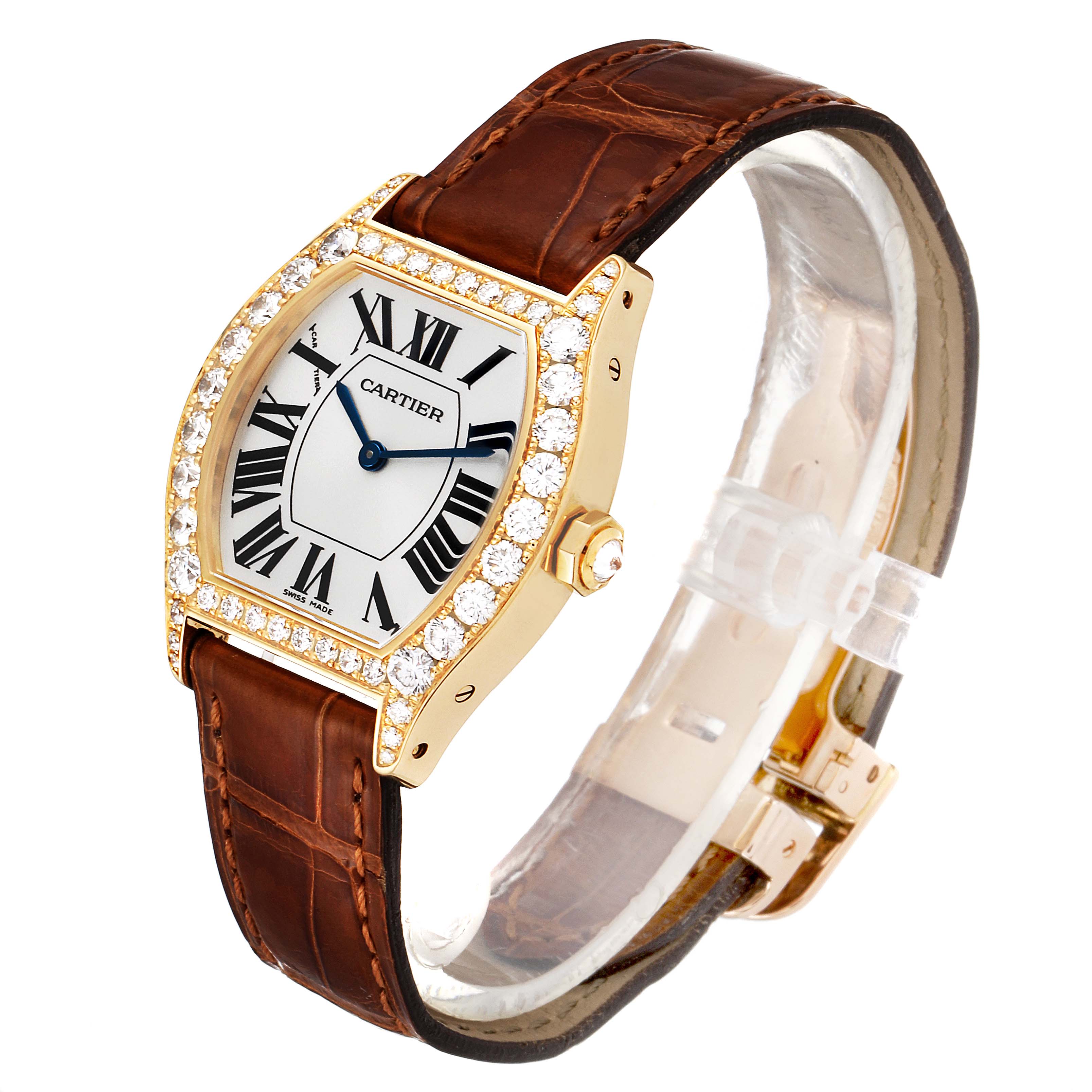 The Cartier Tortue WA503751 Women's Yellow Gold Silver Dial WA503751 Women's Yellow Gold Silver Dial watch is shown at a three-quarter angle, highlighting its diamond-studded bezel, brown leather strap, and Roman numeral dial.