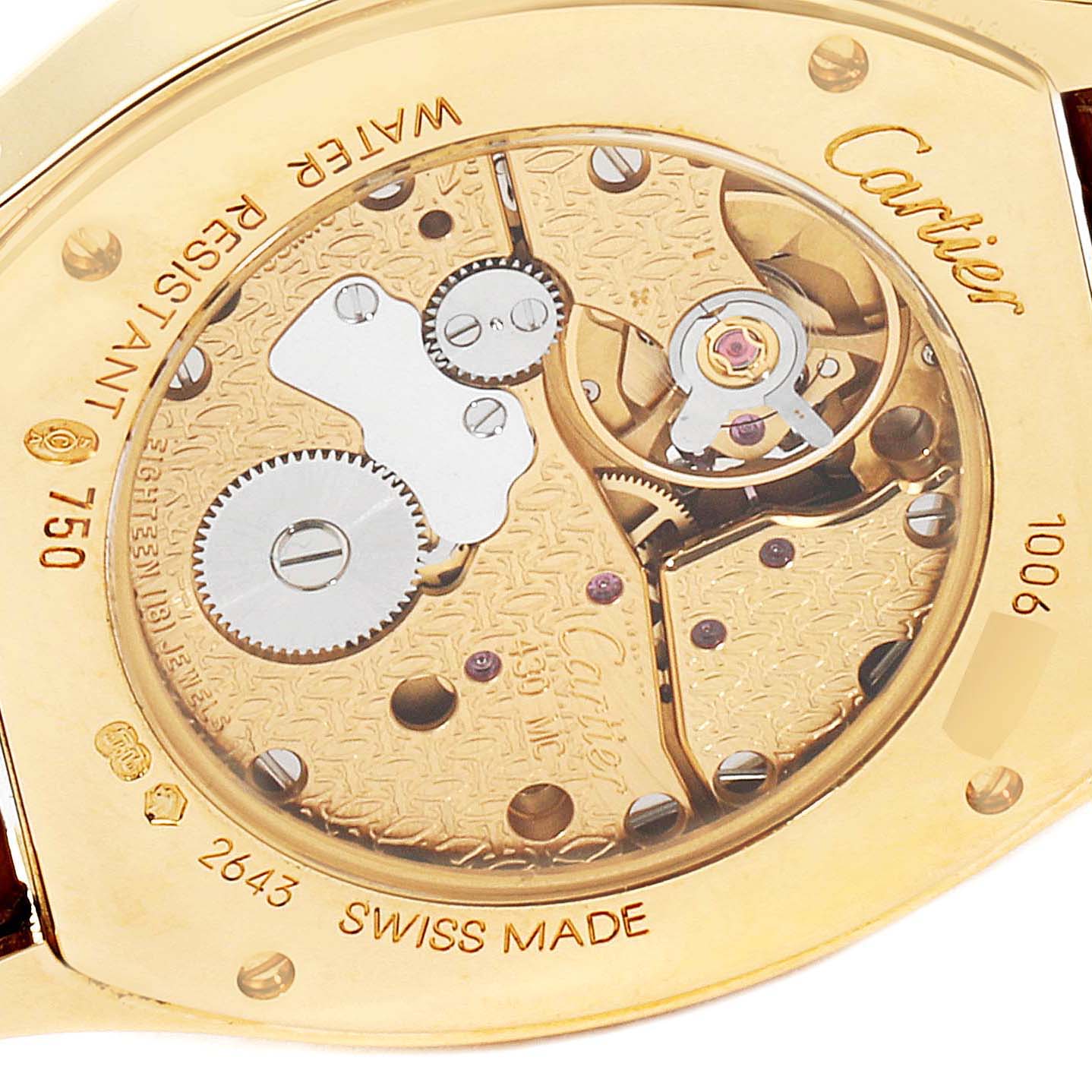 This image shows the back view of the Cartier Tortue WA503751 Women's Yellow Gold Silver Dial WA503751 Women's Yellow Gold Silver Dial watch, focusing on its intricate mechanical movement.
