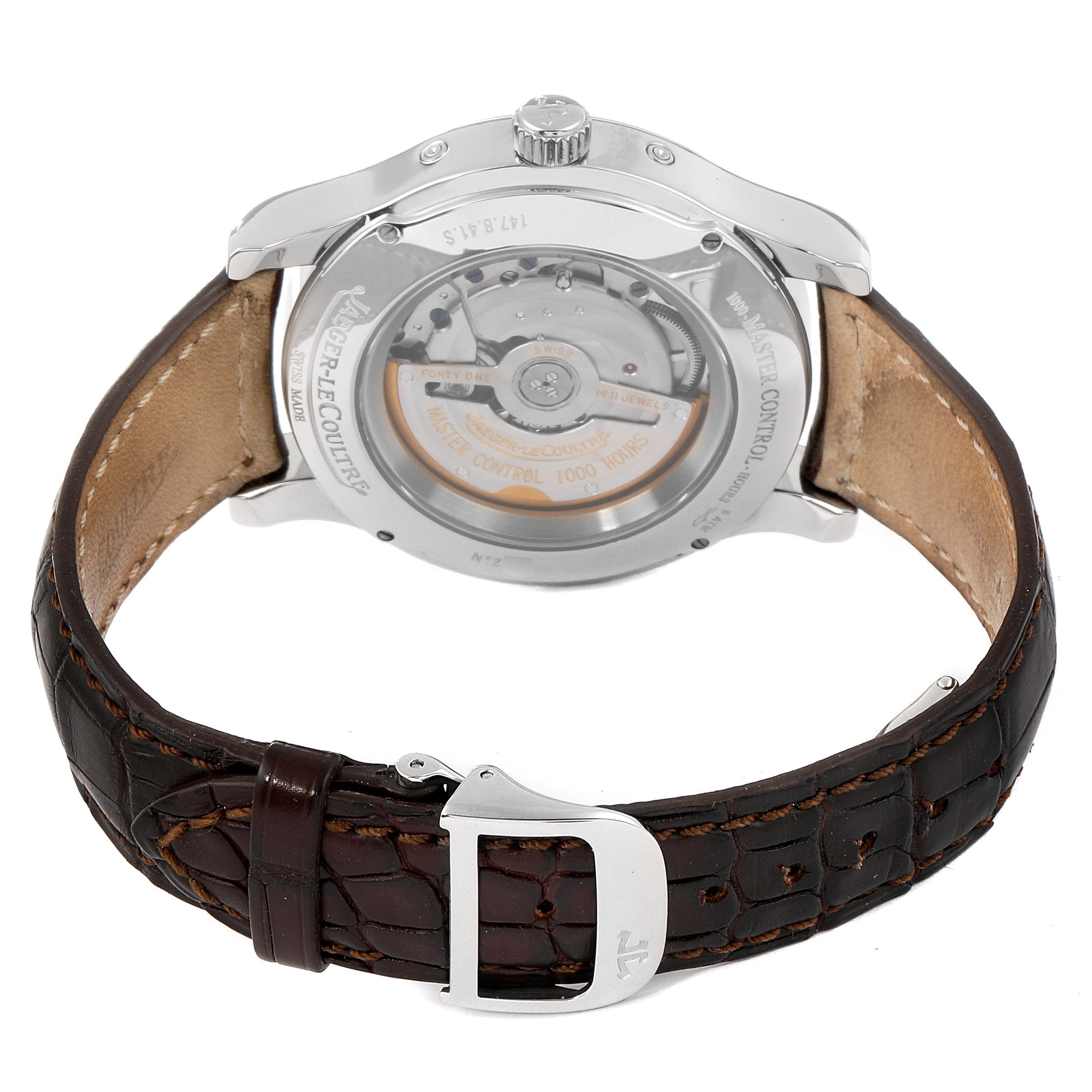 The image shows the back view of a Jaeger LeCoultre Master Q1558420 Men's Stainless Steel Silver Dial Q1558420 Men's Stainless Steel Silver Dial model watch, highlighting the movement and leather strap with buckle.