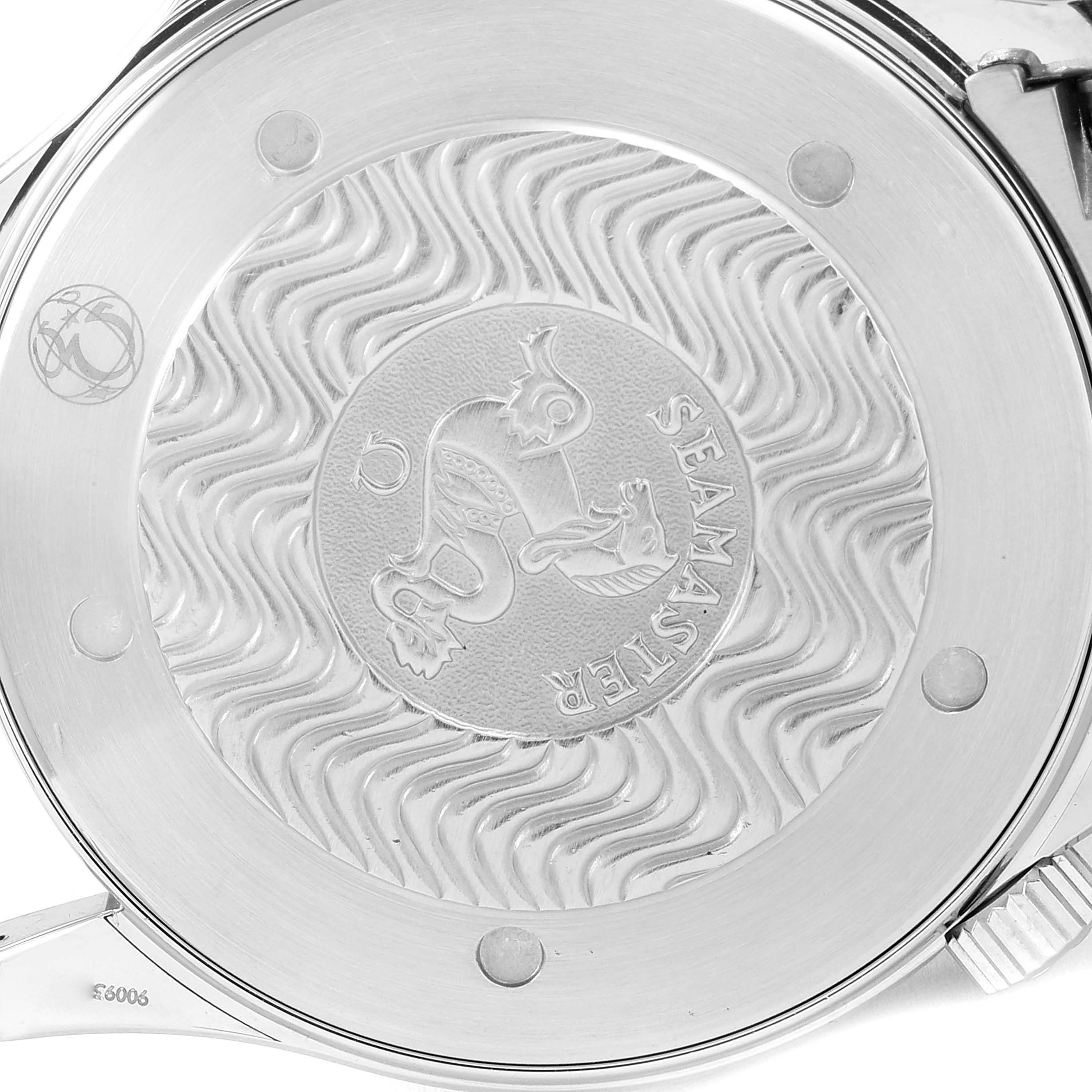 The image shows the case back of an Omega Seamaster 2264.50.00 Men's Stainless Steel Black Dial 2264.50.00 Men's Stainless Steel Black Dial watch with an engraved logo and wavy pattern.