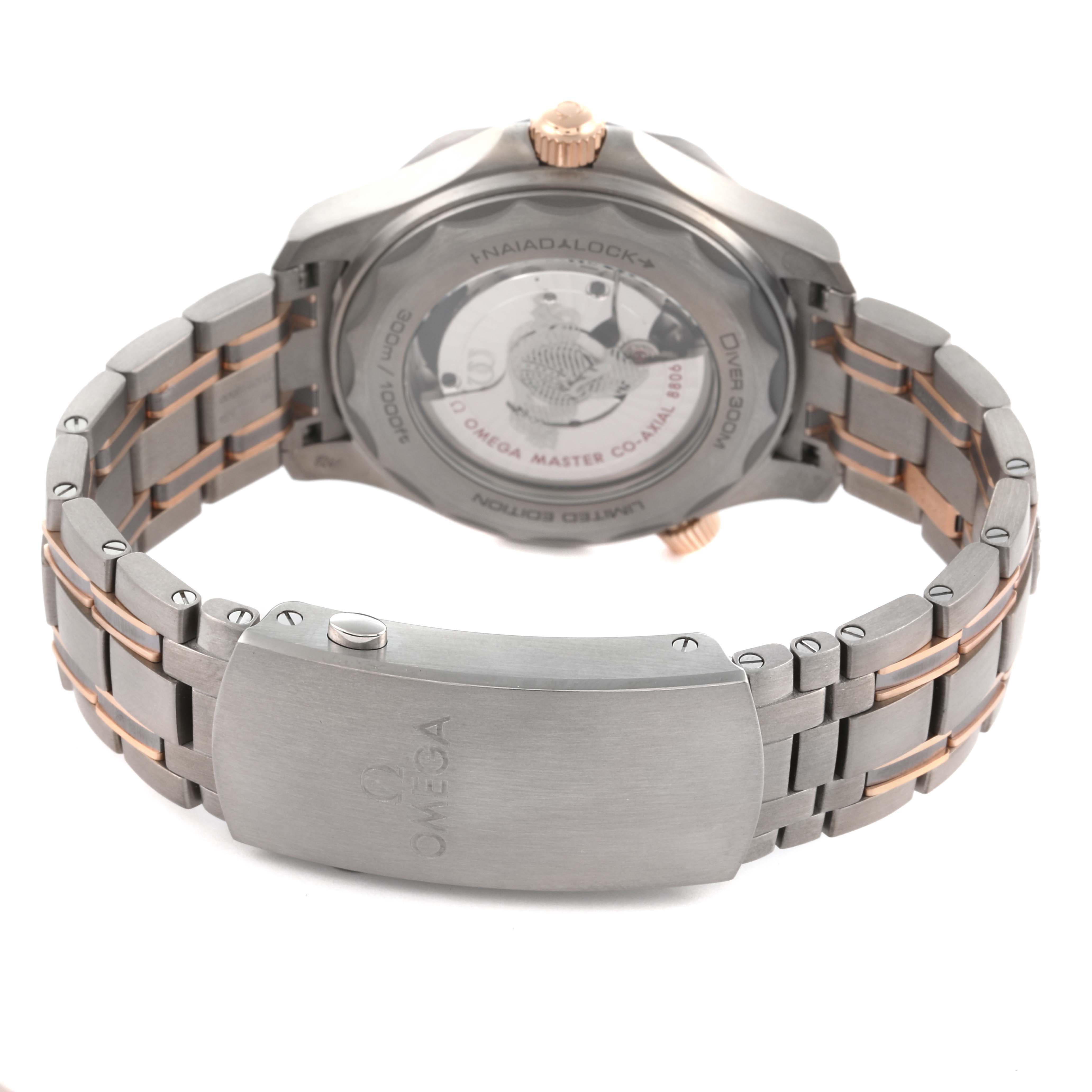 The Omega Seamaster 210.60.42.20.99.001 Men's Titanium Grey Dial 210.60.42.20.99.001 Men's Titanium Grey Dial watch is shown from the back, displaying the case back and the bracelet with the clasp open.