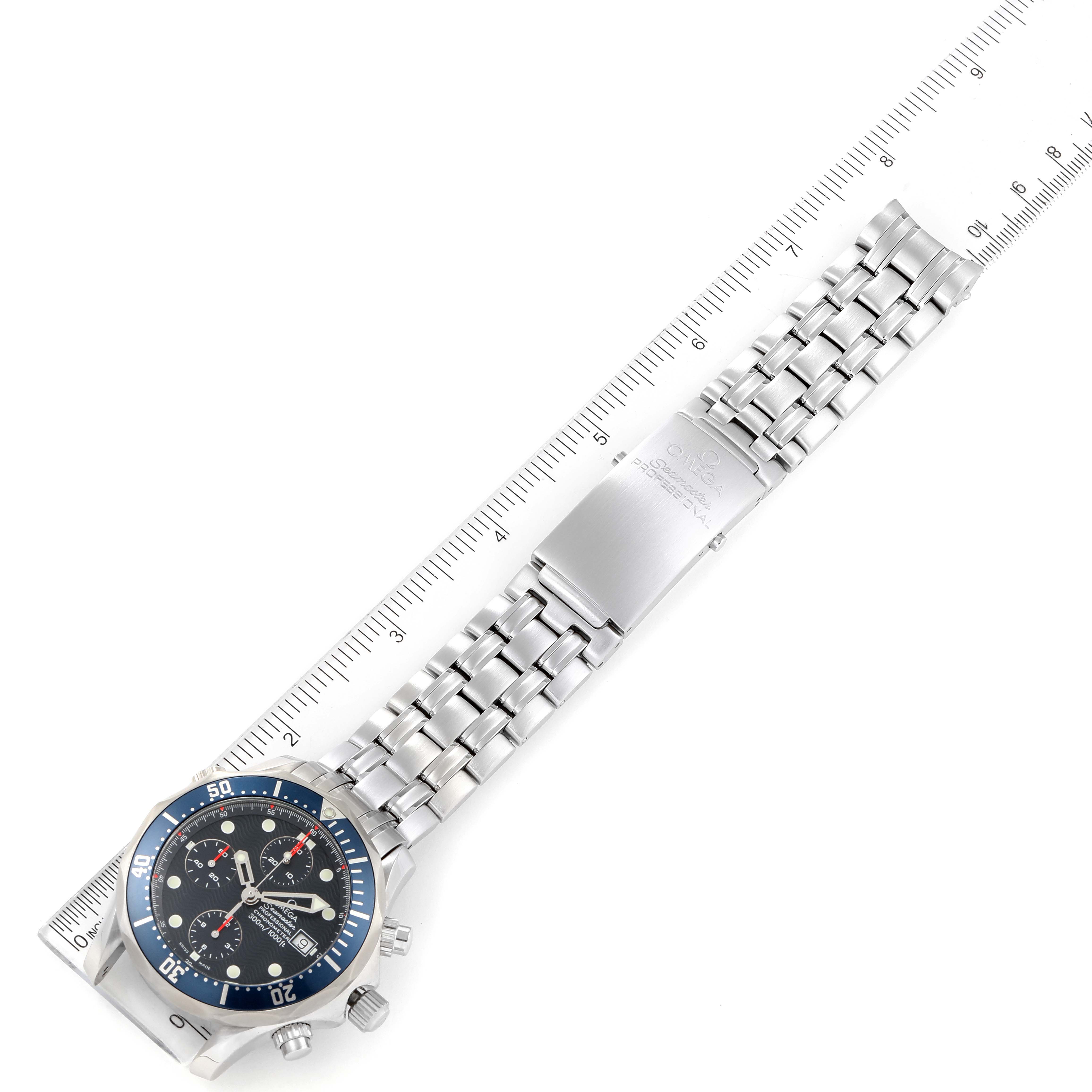 The Omega Seamaster 2599.80.00 Men's Stainless Steel Blue Dial 2599.80.00 Men's Stainless Steel Blue Dial watch is shown laid flat with its stainless steel bracelet and dial visible, next to a ruler for measurement.