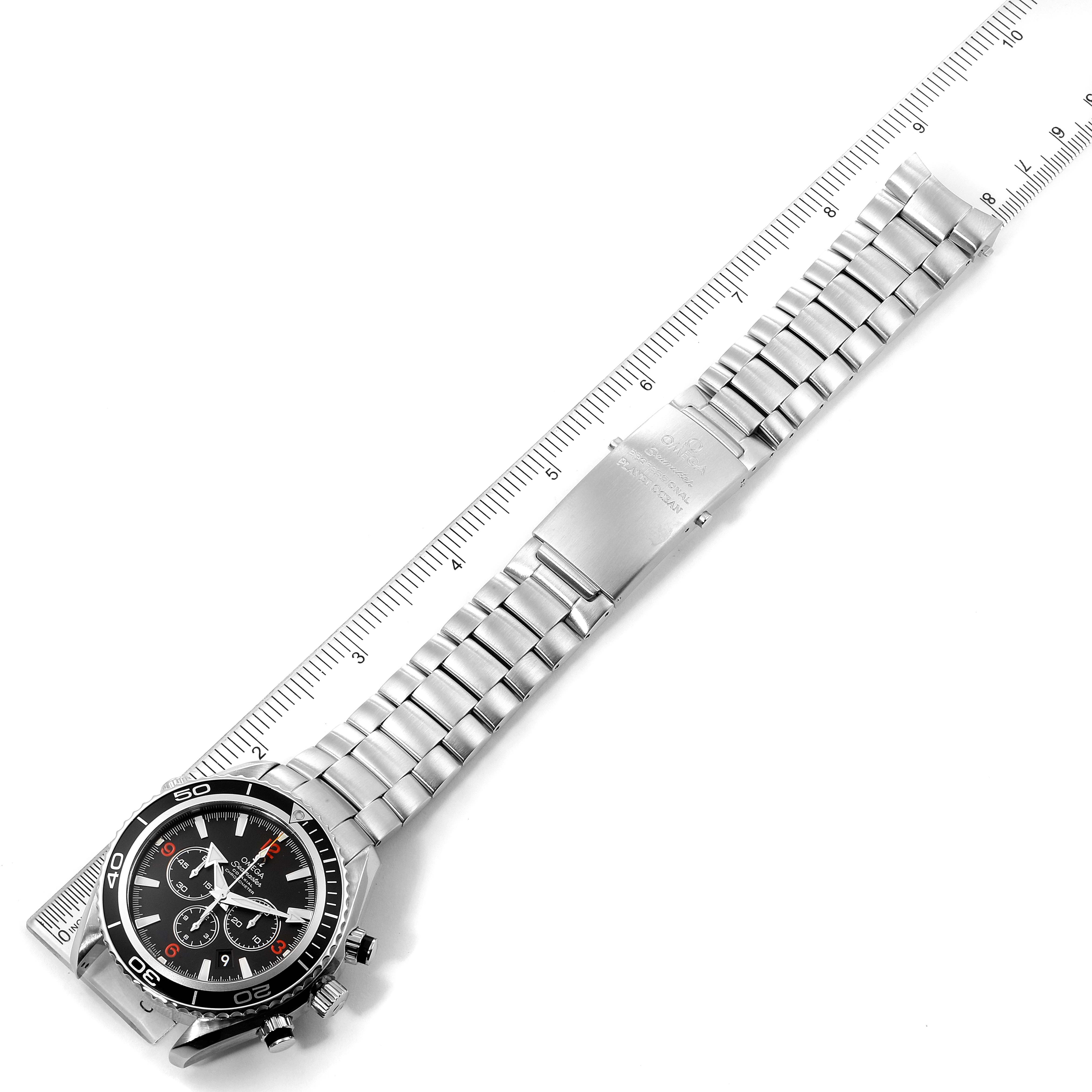 The image shows the full length of an Omega Planet Ocean 2210.51.00 Men's Stainless Steel Black Dial 2210.51.00 Men's Stainless Steel Black Dial watch, including the face, bezel, and metal bracelet, viewed from above.