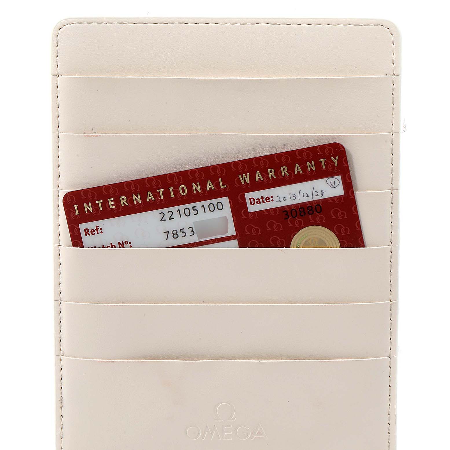 This image shows an Omega International Warranty card in a holder, specifically for the Planet Ocean model.
