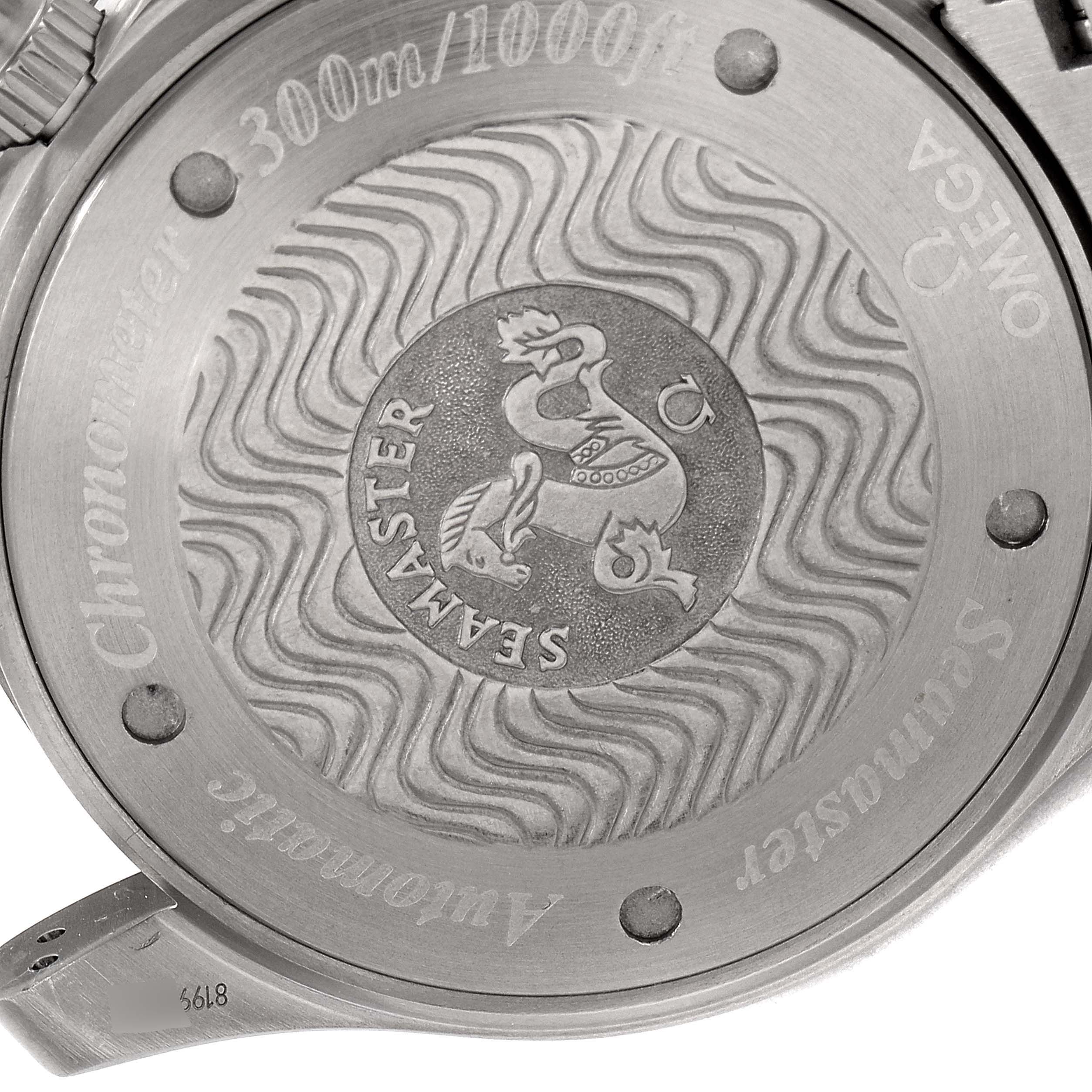 The image shows the case back of an Omega Seamaster 2269.52.00 Men's Titanium Black Dial 2269.52.00 Men's Titanium Black Dial watch, highlighting its engraving and water resistance details.