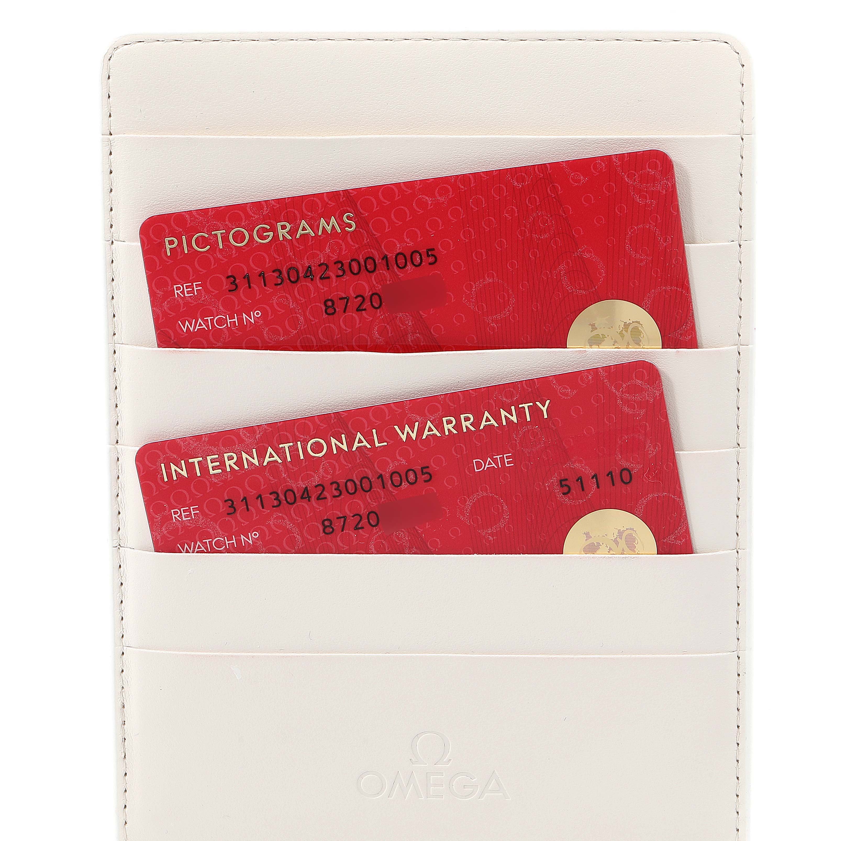 The image shows the international warranty and pictograms cards for an Omega Speedmaster 311.30.42.30.01.005 Men
s Stainless Steel Black Dial 311.30.42.30.01.005 Men
s Stainless Steel Black Dial, encased in a white cardholder.