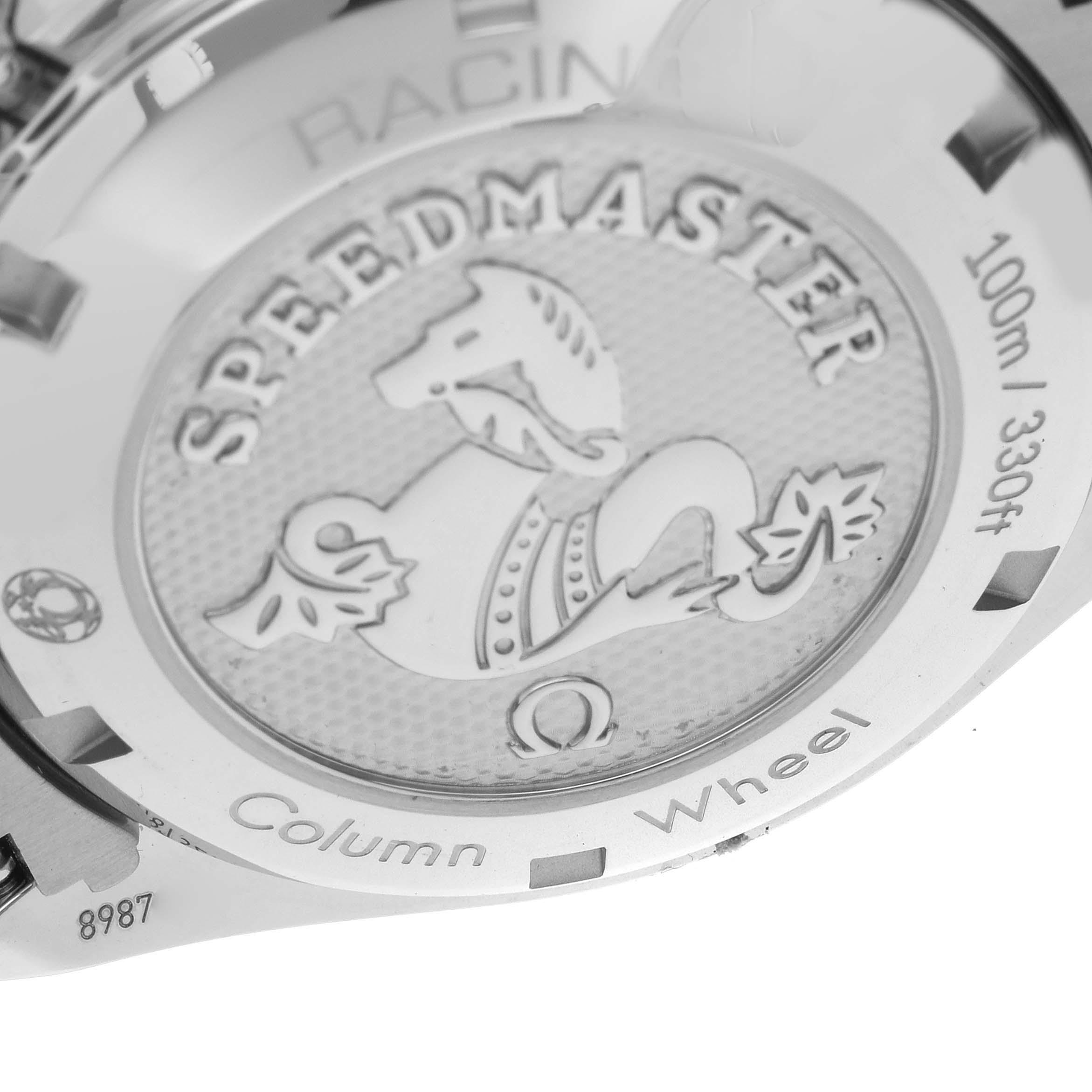 The image shows the back case of an Omega Speedmaster 326.30.40.50.01.002 Men's Stainless Steel Black Dial 326.30.40.50.01.002 Men's Stainless Steel Black Dial, displaying the engraving and water resistance details.