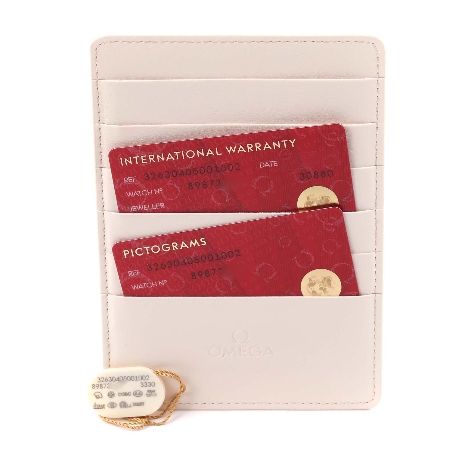 The image shows Omega Speedmaster 326.30.40.50.01.002 Men's Stainless Steel Black Dial 326.30.40.50.01.002 Men's Stainless Steel Black Dial accessories, including a warranty card and a pictogram card in a holder.