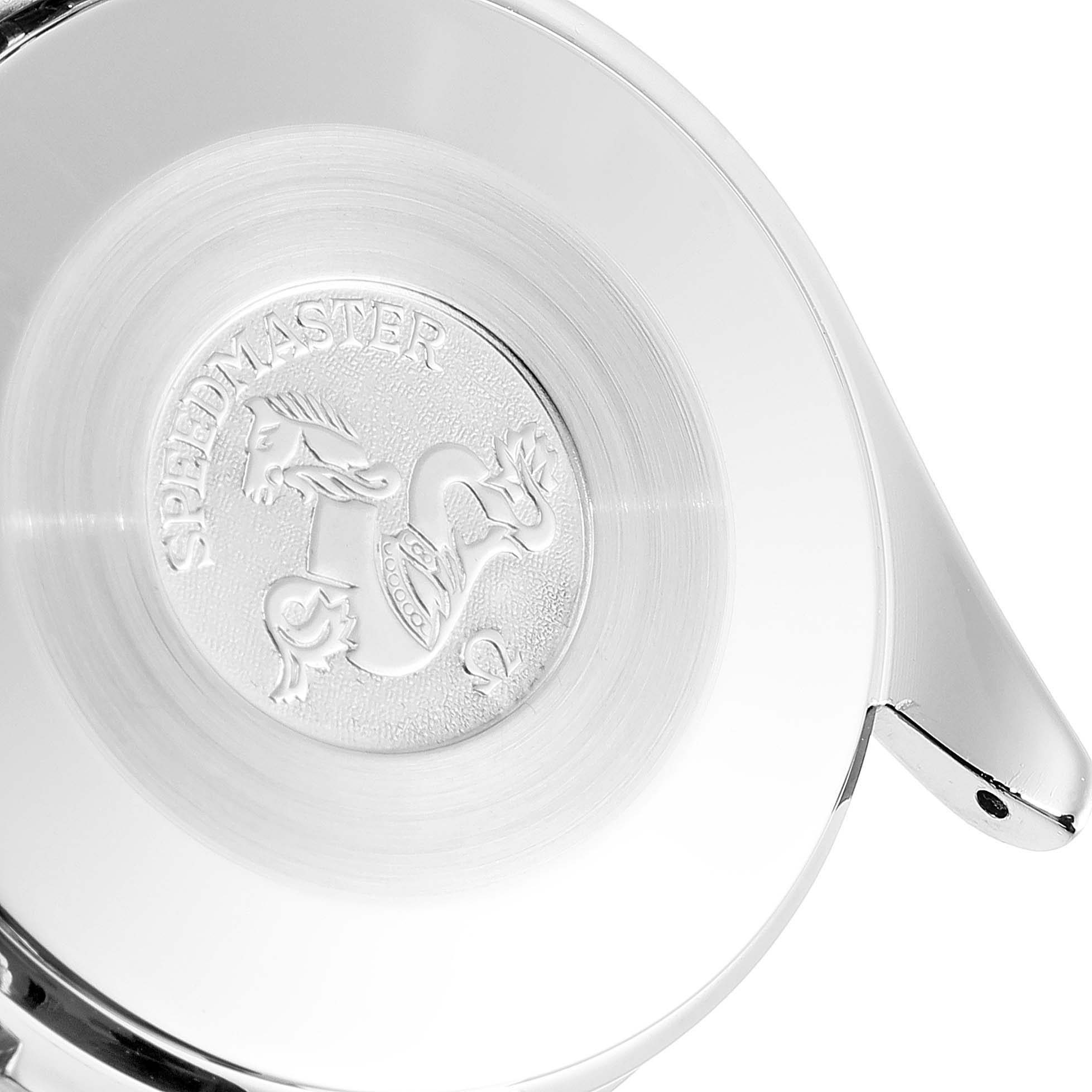 The image shows the case back of an Omega Speedmaster 3310.20.00 Men
s Steel and Gold (two tone) White Dial 3310.20.00 Men
s Steel and Gold (two tone) White Dial watch, highlighting the engraved emblem and brushed metal finish.