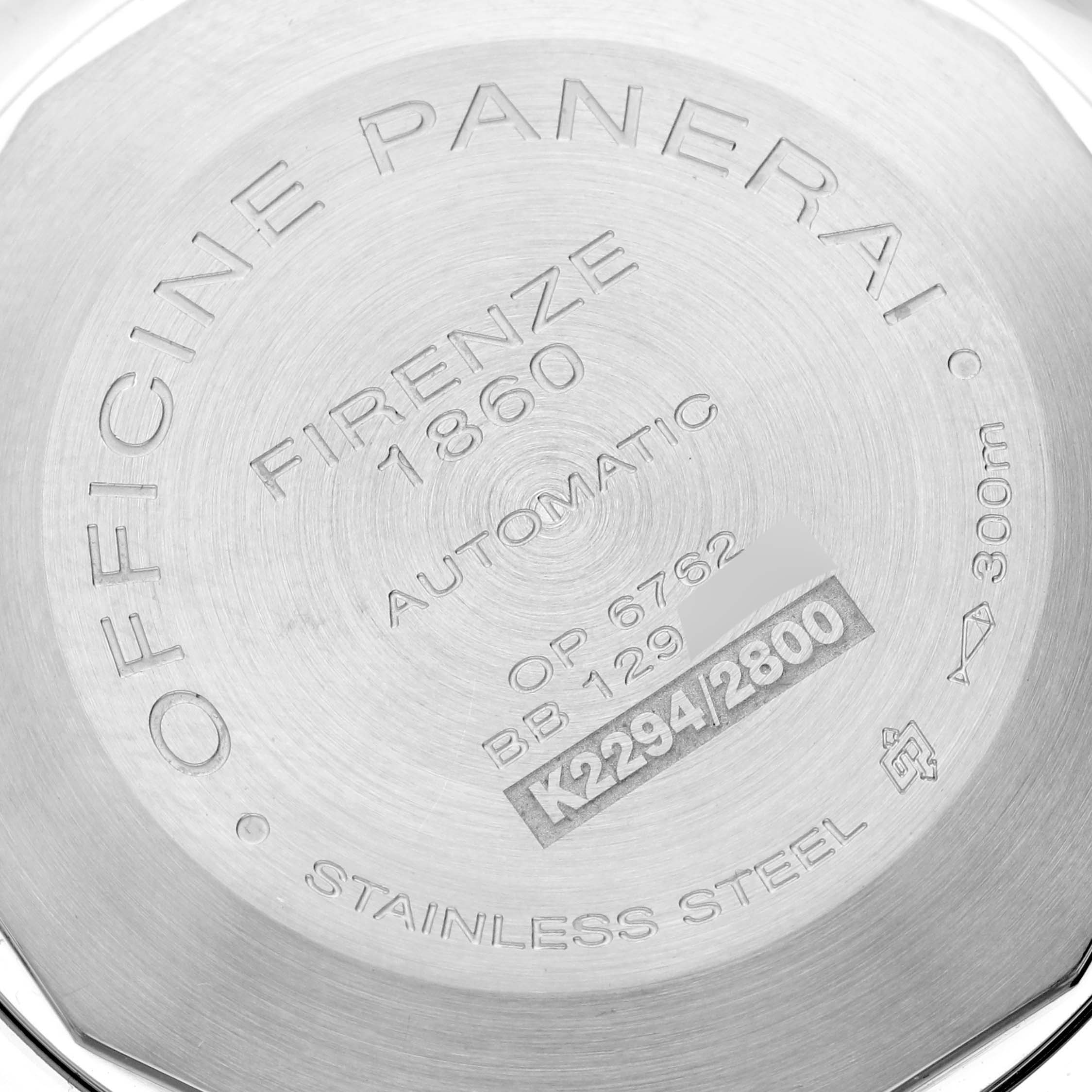 The image shows the back of a Panerai Luminor PAM00090 Men's Stainless Steel Black Dial PAM00090 Men's Stainless Steel Black Dial watch, displaying engravings and serial numbers.