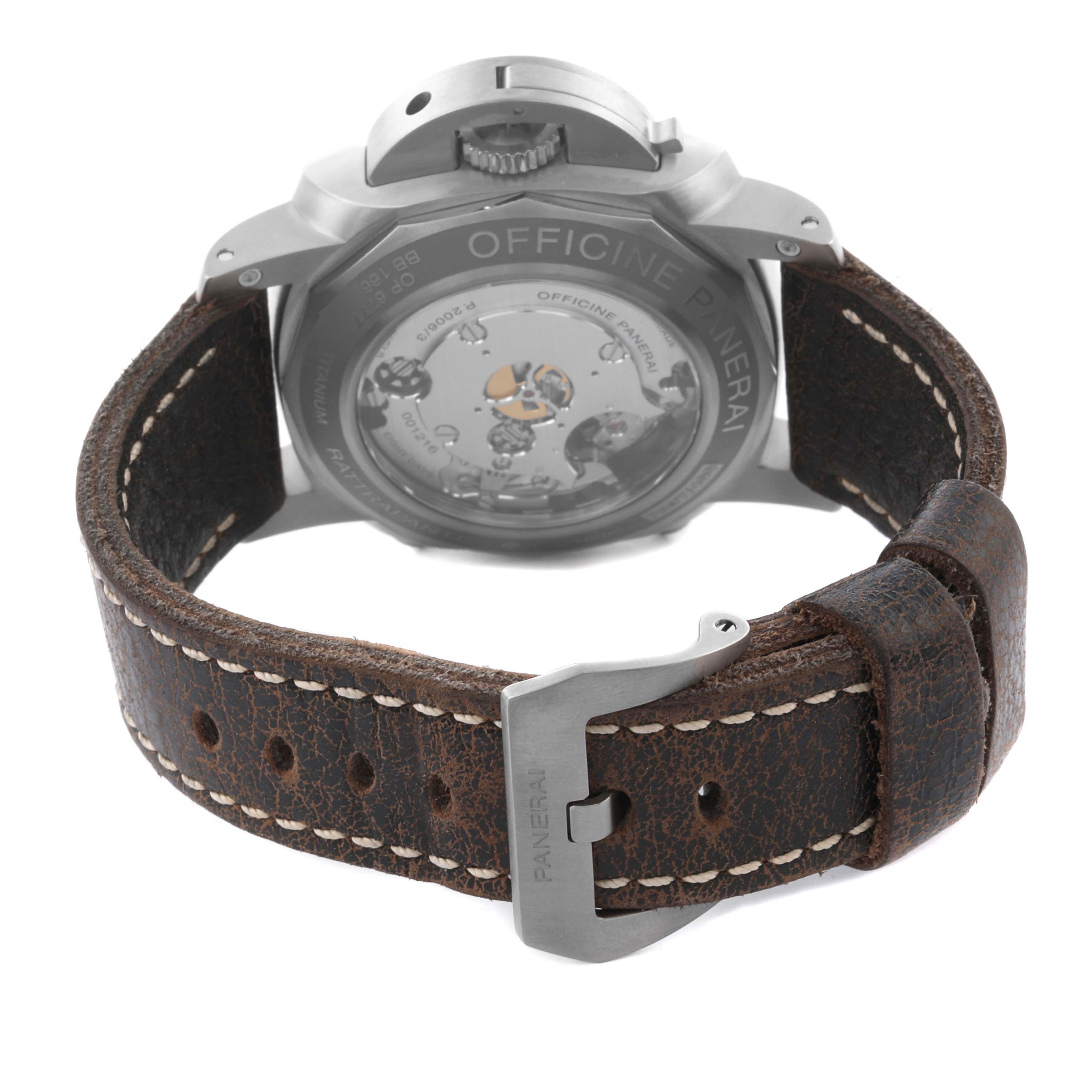 The image shows the back and strap of a Panerai Luminor PAM00530 Men's Titanium Black Dial PAM00530 Men's Titanium Black Dial watch, highlighting its movement and leather band.