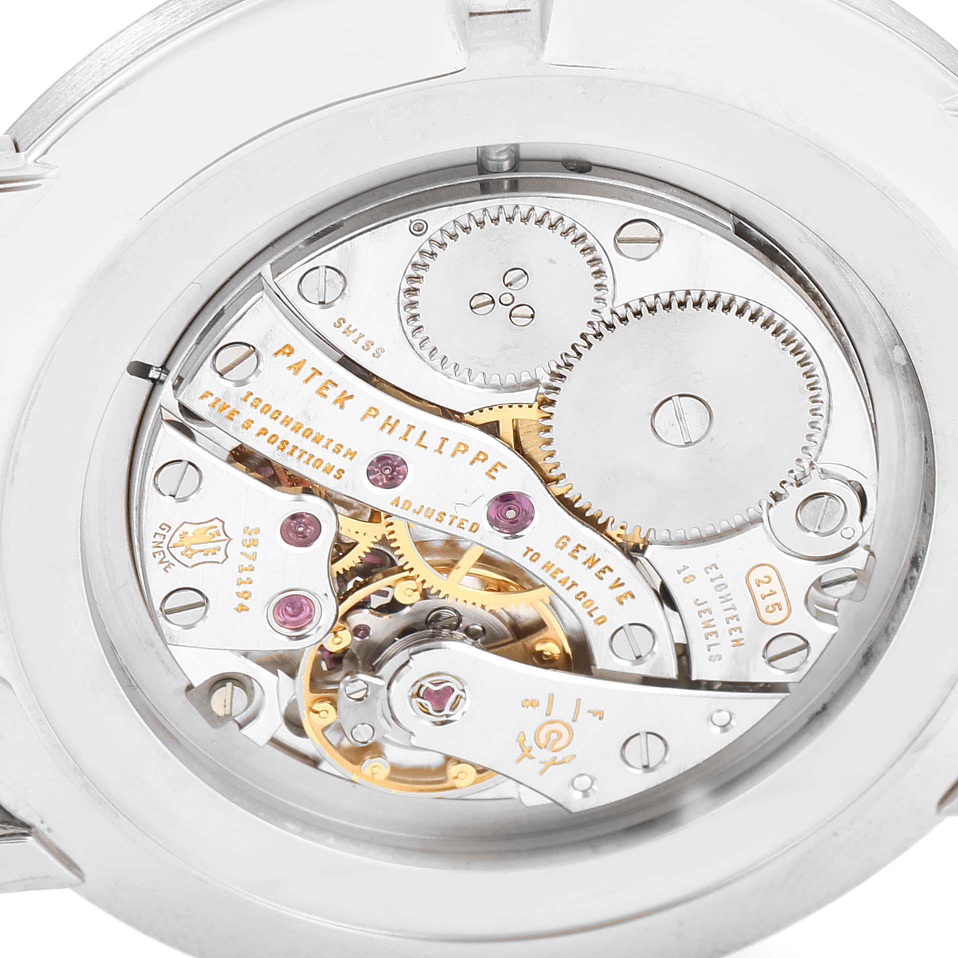 The image shows the back view of the Patek Philippe Calatrava 5119G Men's White Gold White Dial 5119G Men's White Gold White Dial watch, highlighting its intricate mechanical movement.