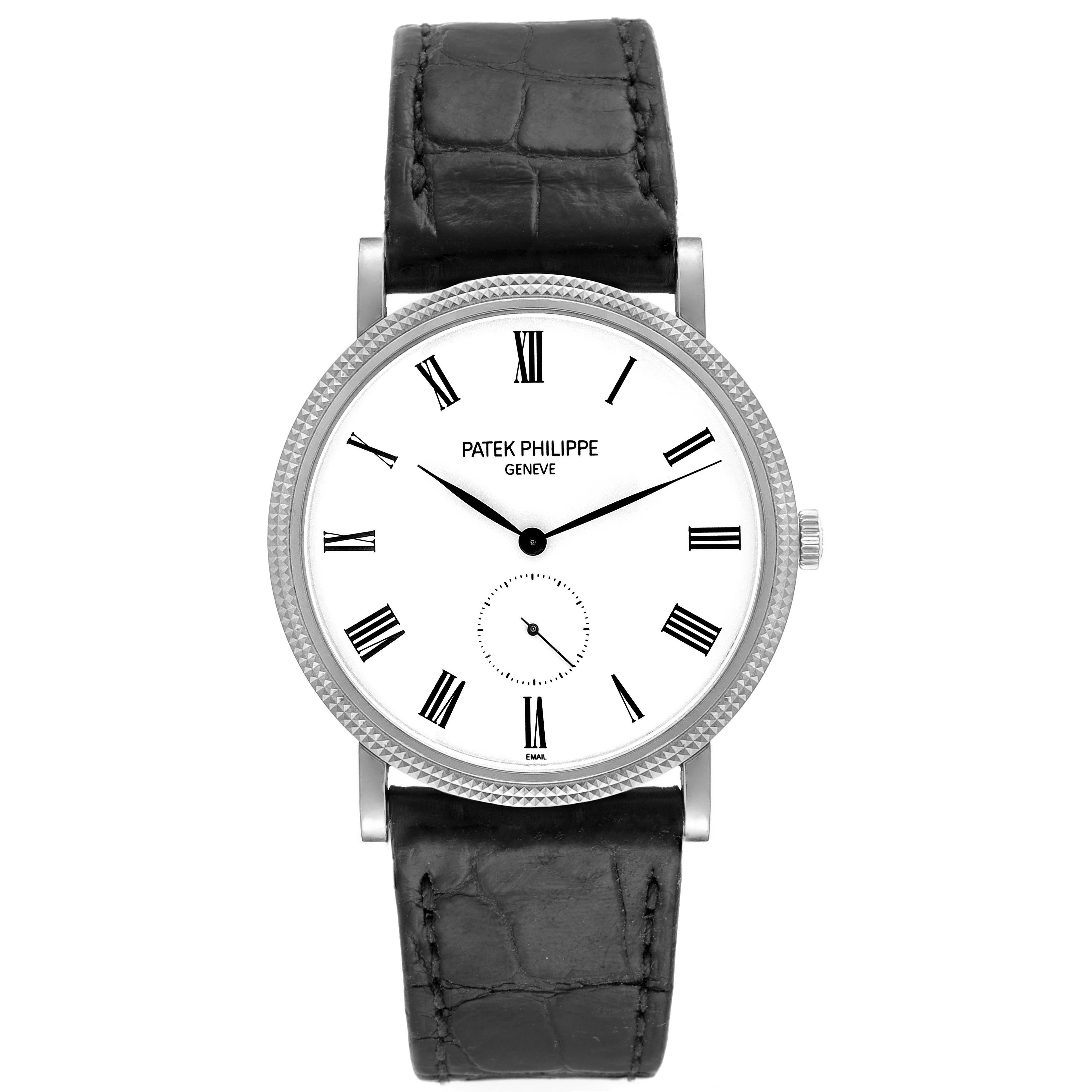 This image shows a frontal view of a Patek Philippe Calatrava 5116G Men's White Gold White Dial 5116G Men's White Gold White Dial watch, highlighting its white dial, Roman numerals, and black leather strap.