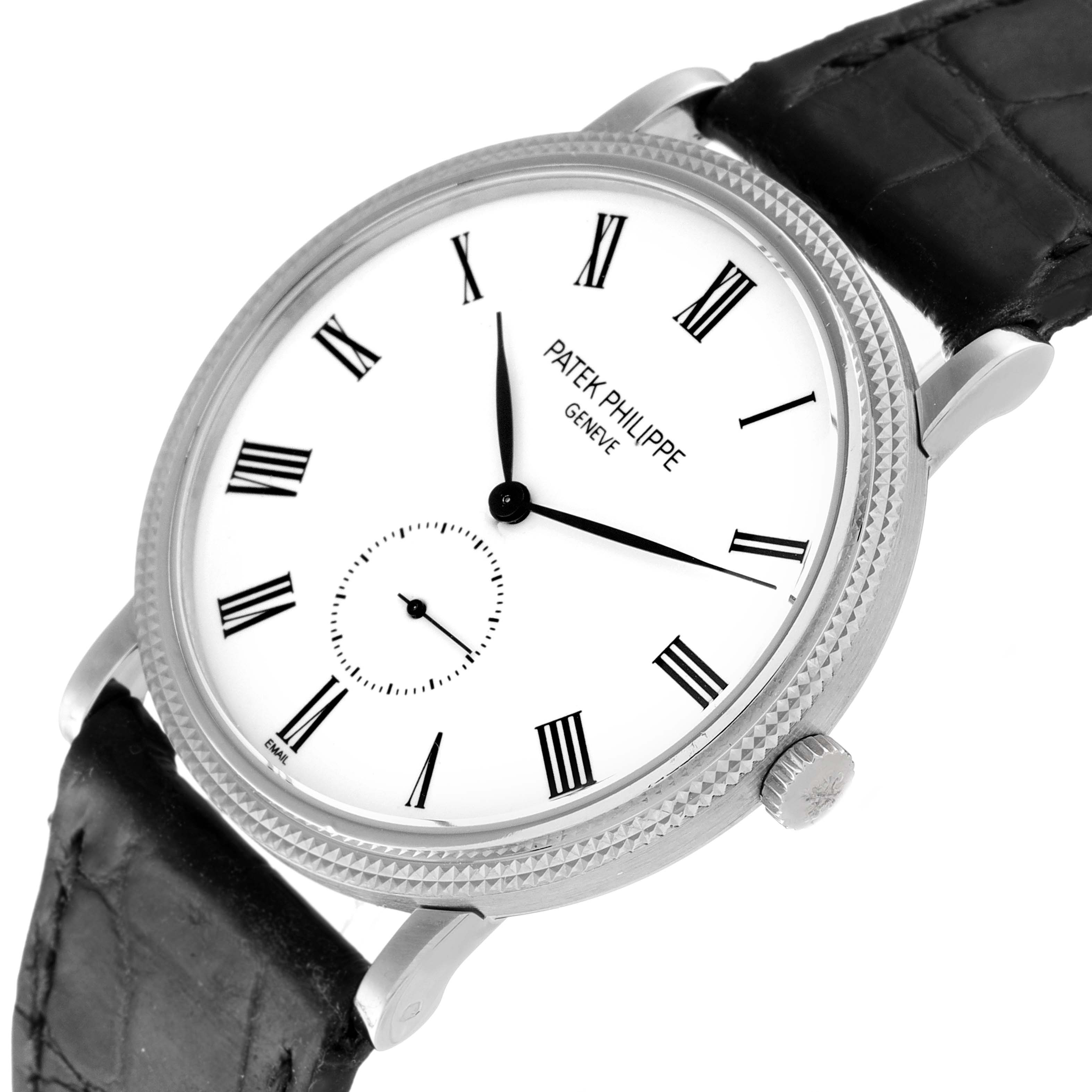 The image shows a Patek Philippe Calatrava 5116G Men's White Gold White Dial 5116G Men's White Gold White Dial watch at an angled view, highlighting the dial, bezel, and part of the leather strap.