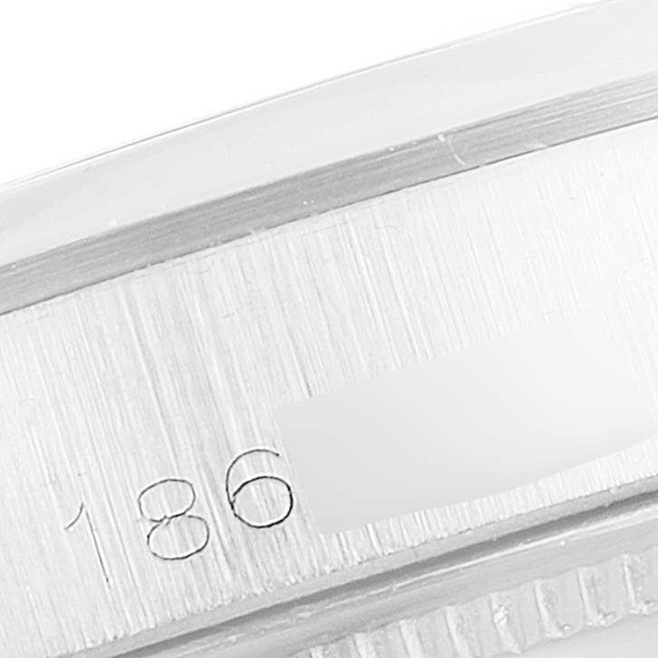 This image shows a close-up detail of the serial number on the side of the case of the Rolex Vintage Collection 5500 Men's Stainless Steel Silver Dial 5500 Men's Stainless Steel Silver Dial watch.