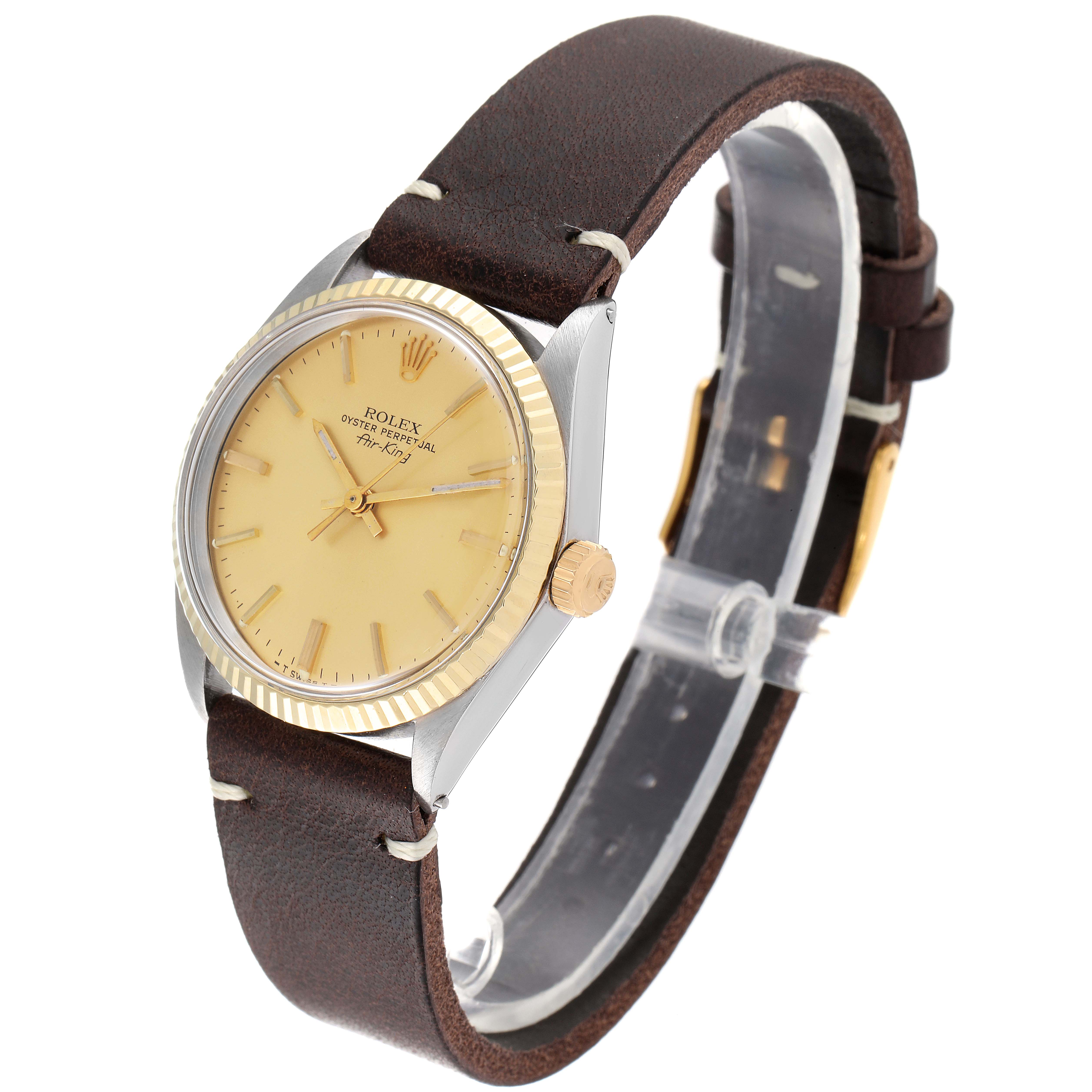 The Rolex Vintage Collection 5500 Men's Steel and Gold (two tone) Champagne Dial 5500 Men's Steel and Gold (two tone) Champagne Dial watch is shown at a three-quarter angle, highlighting its face, bezel, and leather strap.