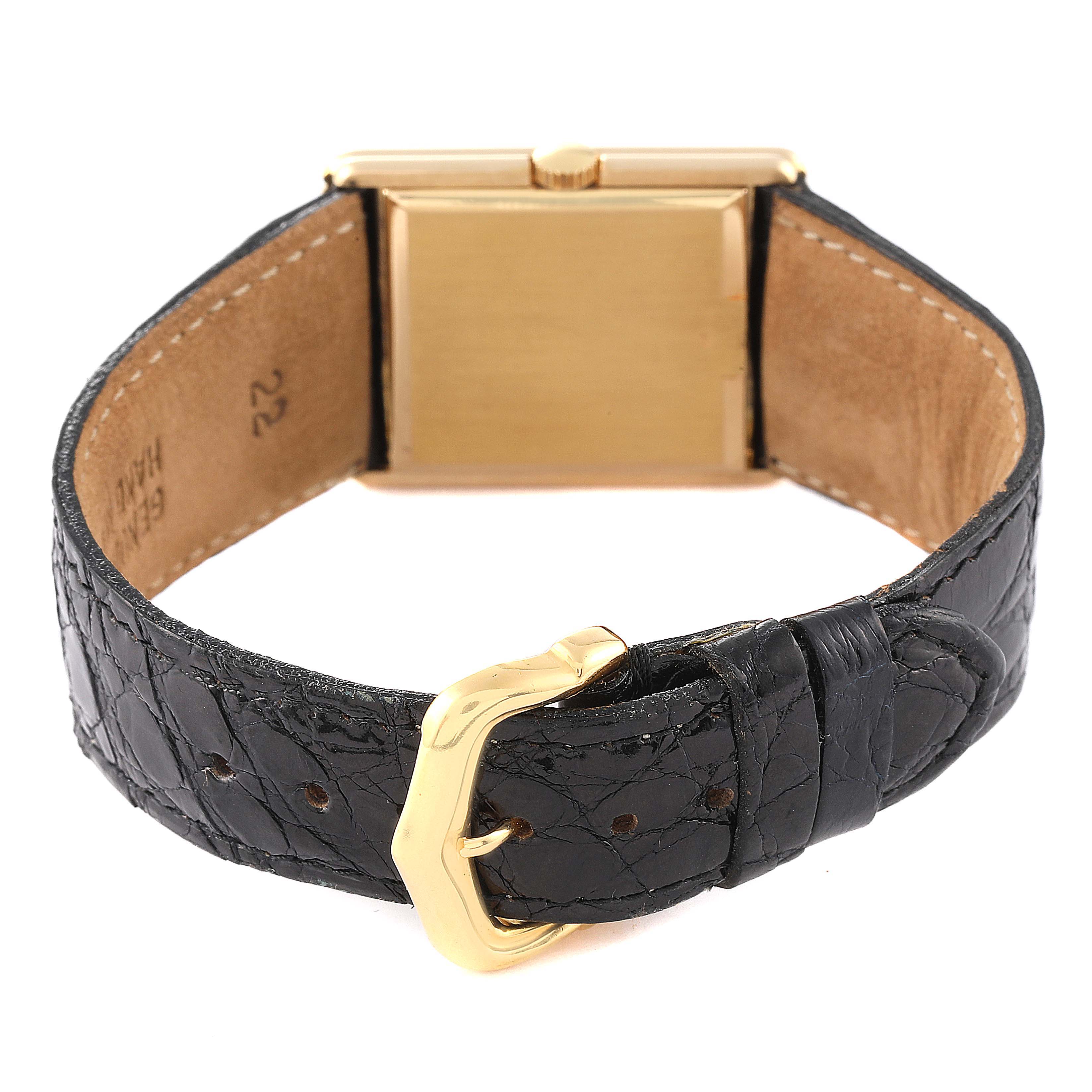 This image shows the back view of the Rolex Cellini 4016 Men's Yellow Gold White Dial 4016 Men's Yellow Gold White Dial watch, highlighting the leather strap and gold buckle.