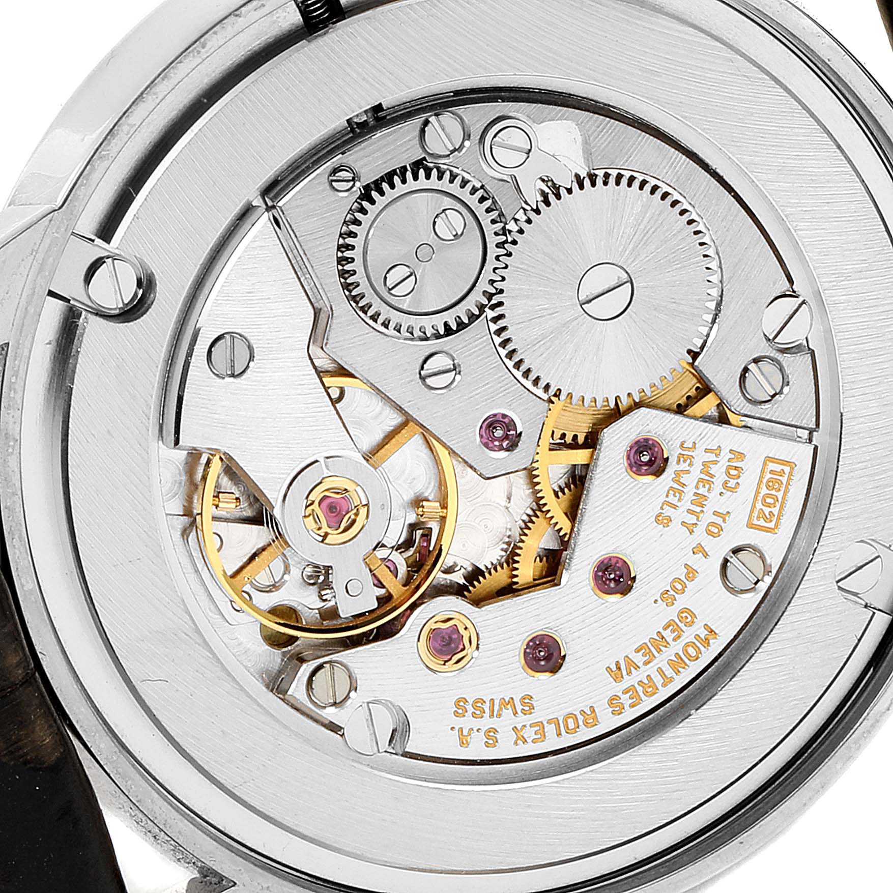 This is a close-up of the back view of the Rolex Cellini 5116 Men's White Gold Brown Dial 5116 Men's White Gold Brown Dial watch, showing its intricate mechanical movement.
