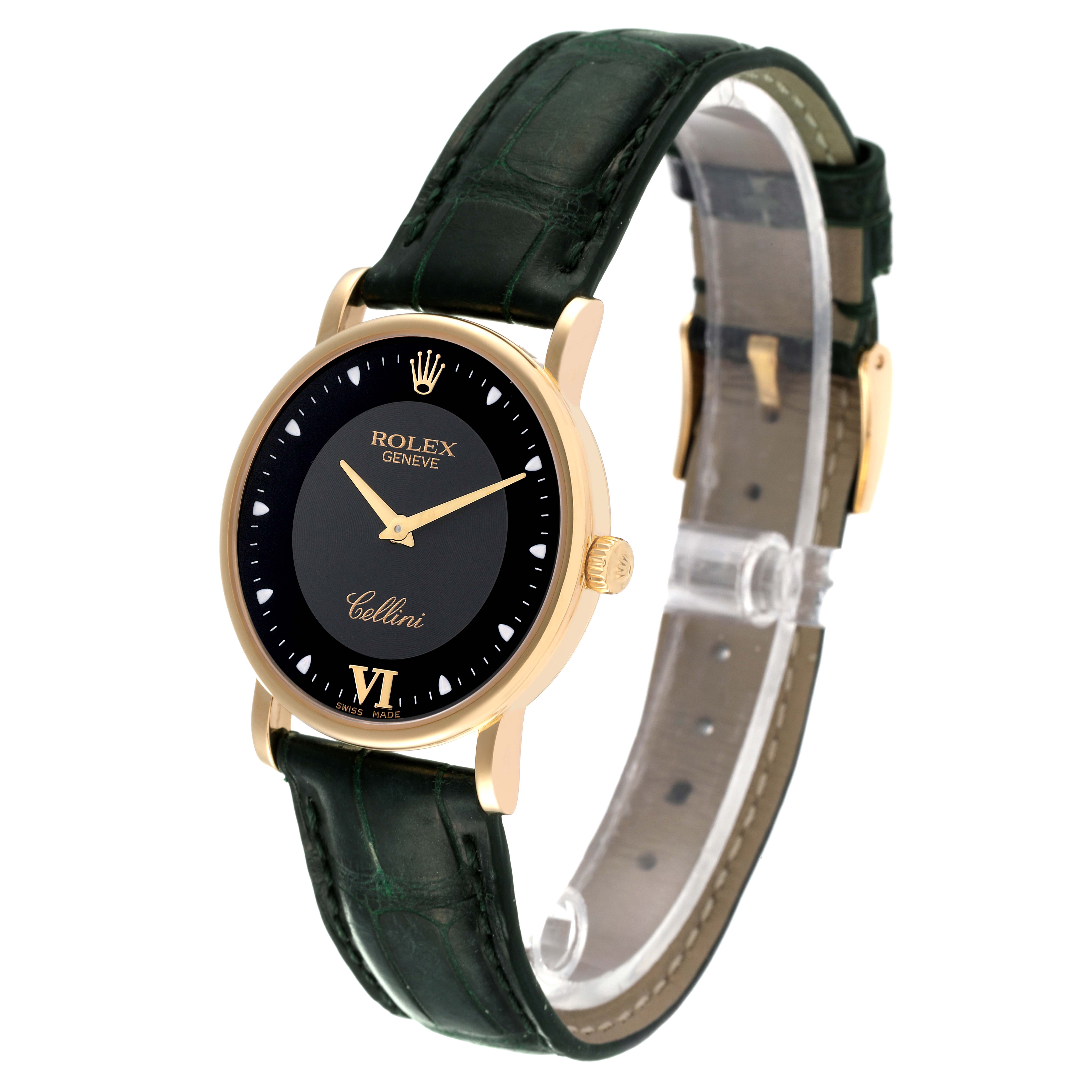 The Rolex Cellini 5115 Men's Yellow Gold Black Dial 5115 Men's Yellow Gold Black Dial watch is shown at a slight angle, displaying its gold case, black dial, and dark green leather strap.