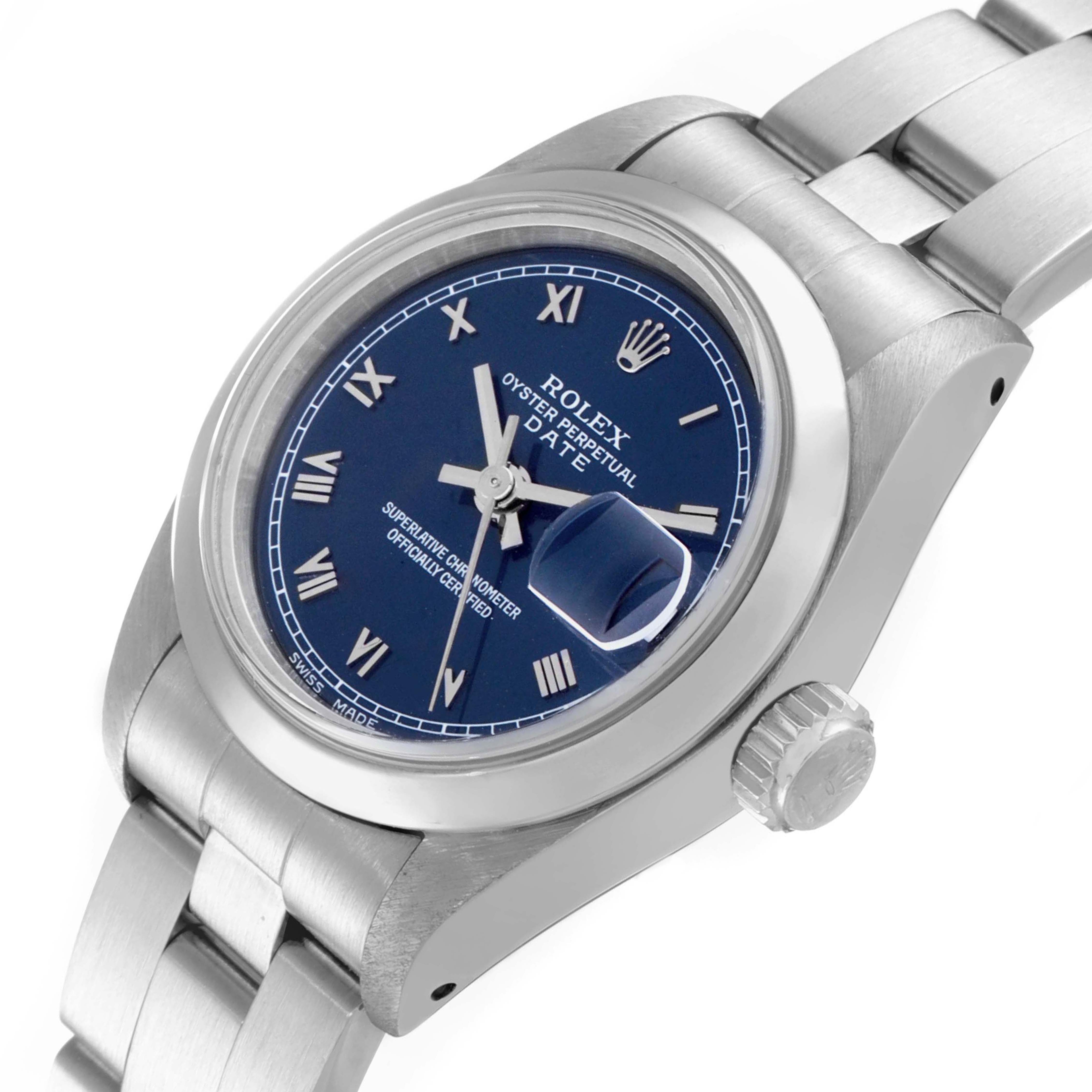 This image shows a close-up of a Rolex Date 69160 Women's Stainless Steel Blue Dial 69160 Women's Stainless Steel Blue Dial model watch, focusing on the dial, crown, and part of the bracelet.