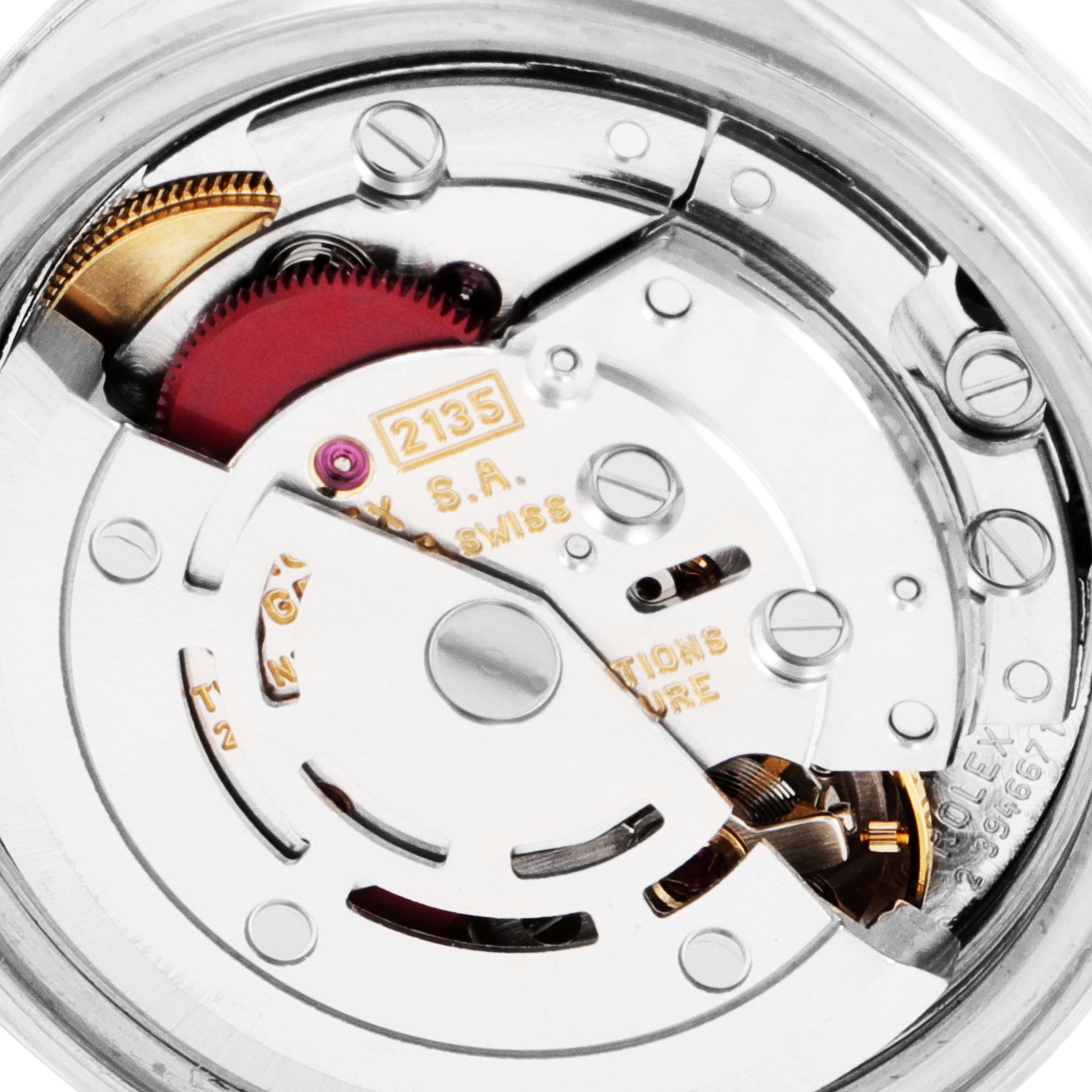 The image shows the internal mechanism of a Rolex Date 69160 Women's Stainless Steel Blue Dial 69160 Women's Stainless Steel Blue Dial model watch, focusing on the movement components.