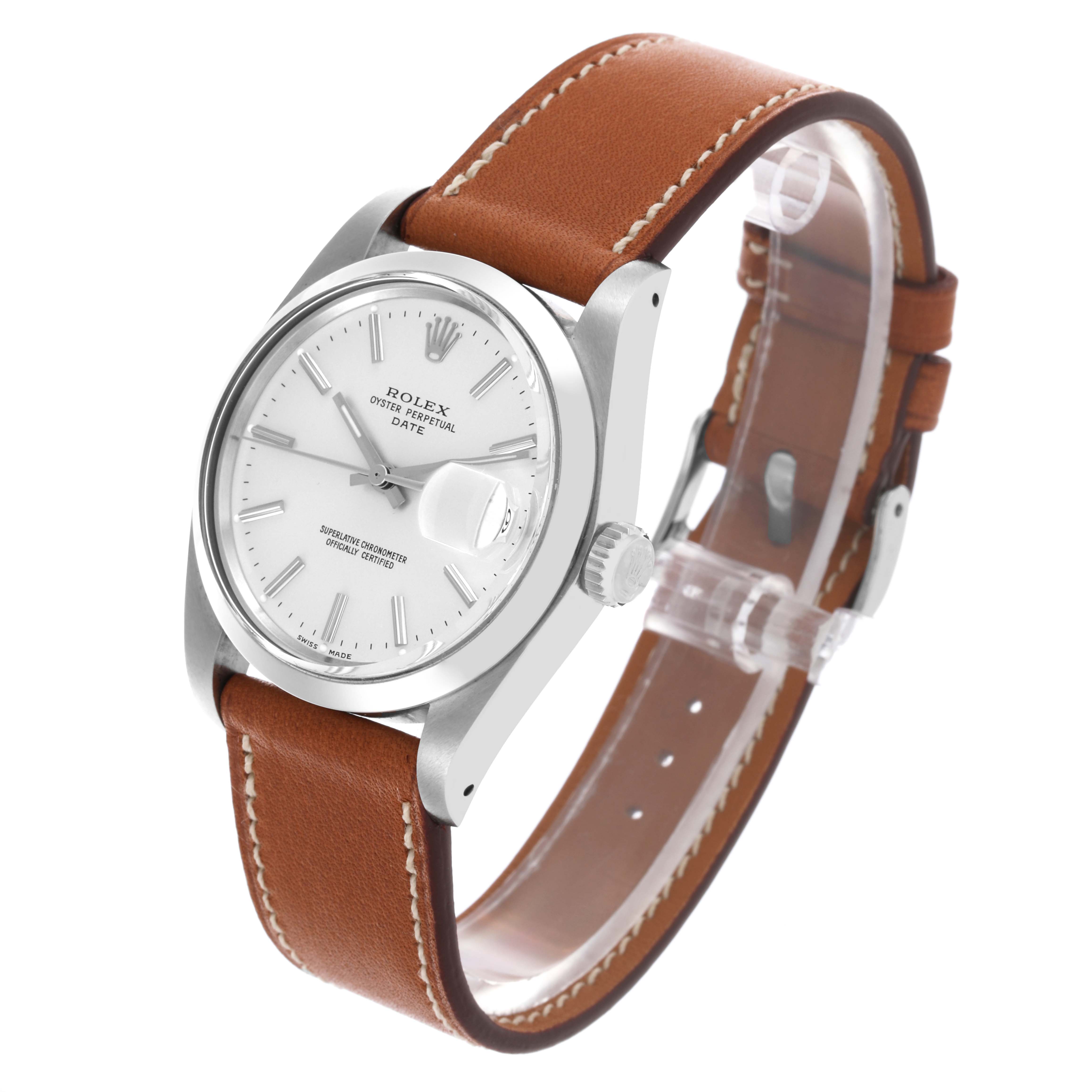 The Rolex Date 1500 Men's Stainless Steel Silver Dial 1500 Men's Stainless Steel Silver Dial watch is shown at a slight angle, displaying the dial, case, crown, and leather strap.