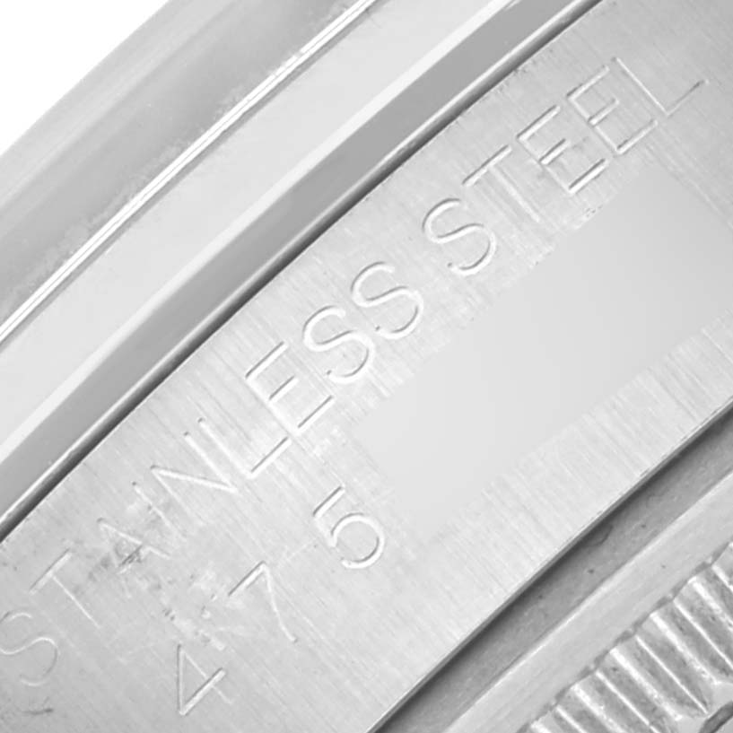 The close-up image shows the side engraving of a Rolex Date 1500 Men's Stainless Steel Silver Dial 1500 Men's Stainless Steel Silver Dial model watch caseback, highlighting "STAINLESS STEEL."