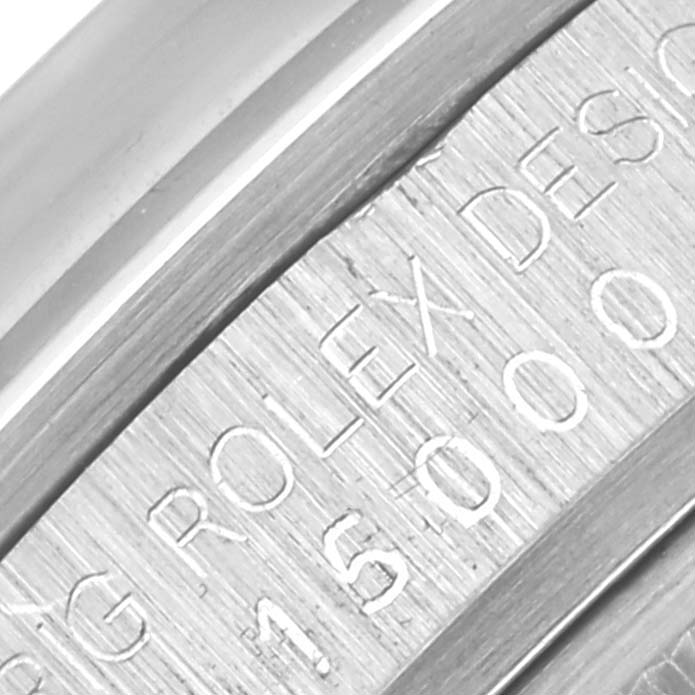 This image shows a close-up of the engraved inner bezel of a Rolex Date 15000 Men's Stainless Steel Silver Dial 15000 Men's Stainless Steel Silver Dial model watch.