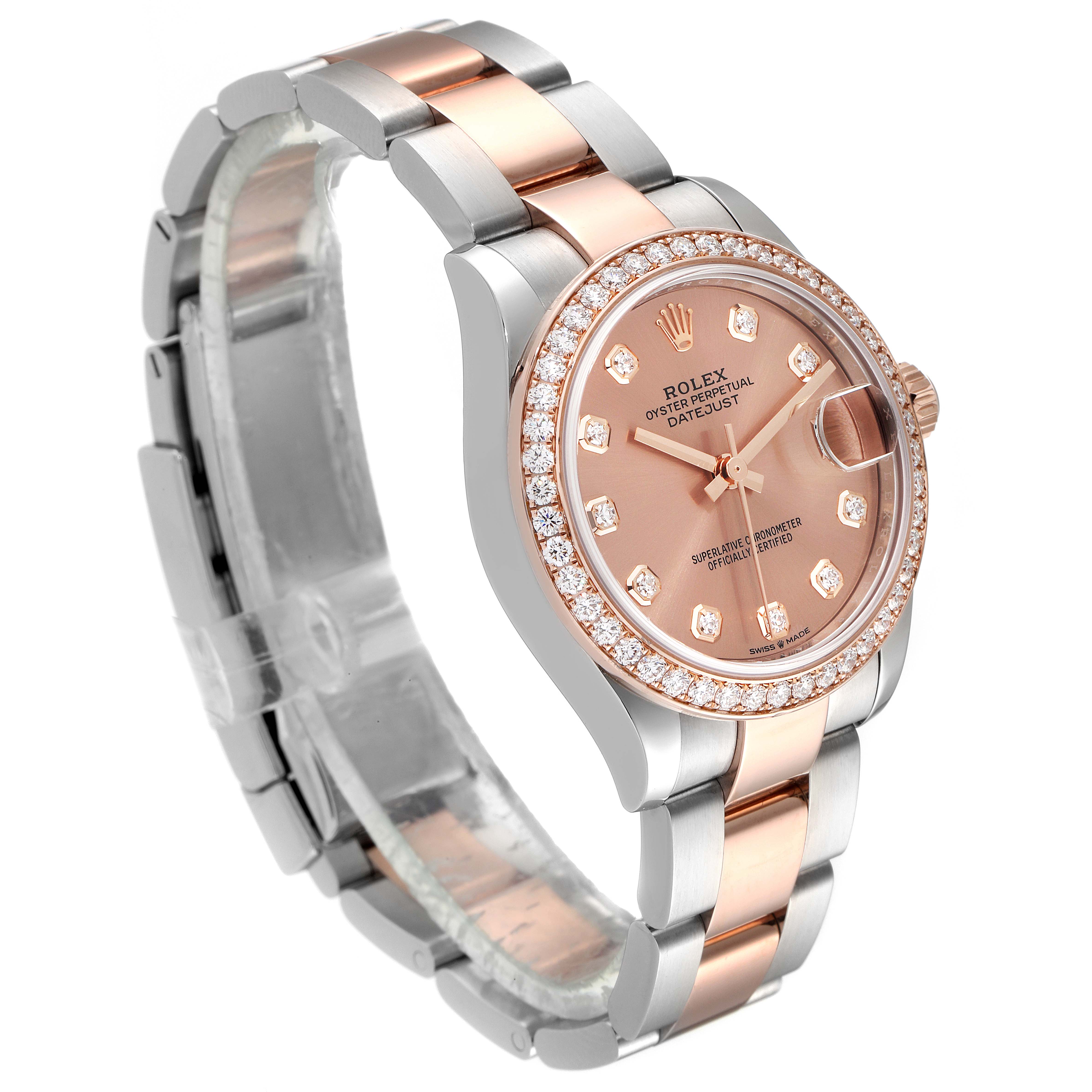 The image shows a side angle view of a Rolex Mid-Size 278381 Women's Steel and Gold (two tone) Pink Dial 278381 Women's Steel and Gold (two tone) Pink Dial Datejust watch, highlighting the dial, bezel, and bracelet.