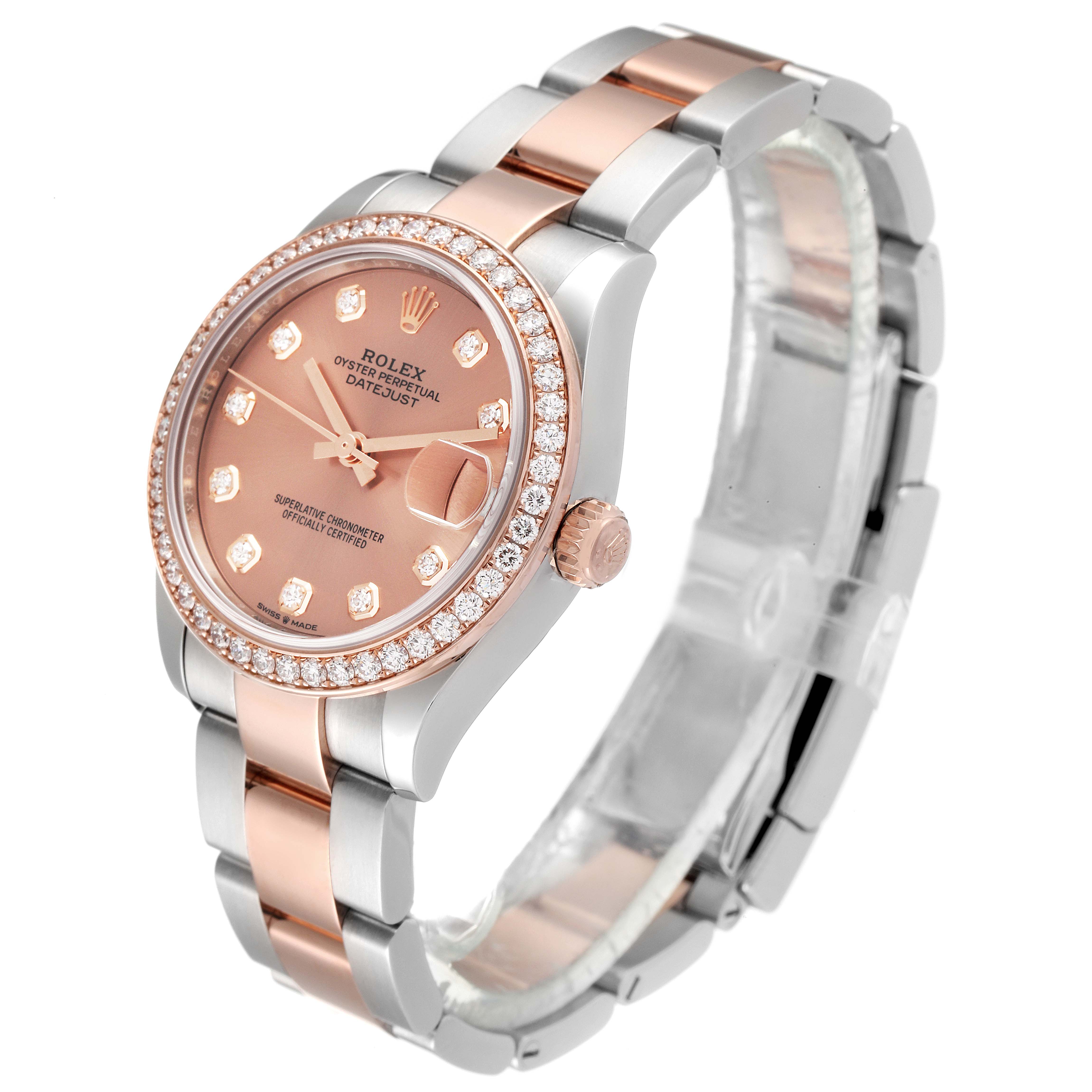 The image shows a Rolex Mid-Size 278381 Women's Steel and Gold (two tone) Pink Dial 278381 Women's Steel and Gold (two tone) Pink Dial Datejust model from an angled side view, highlighting the bezel, dial, and bracelet.