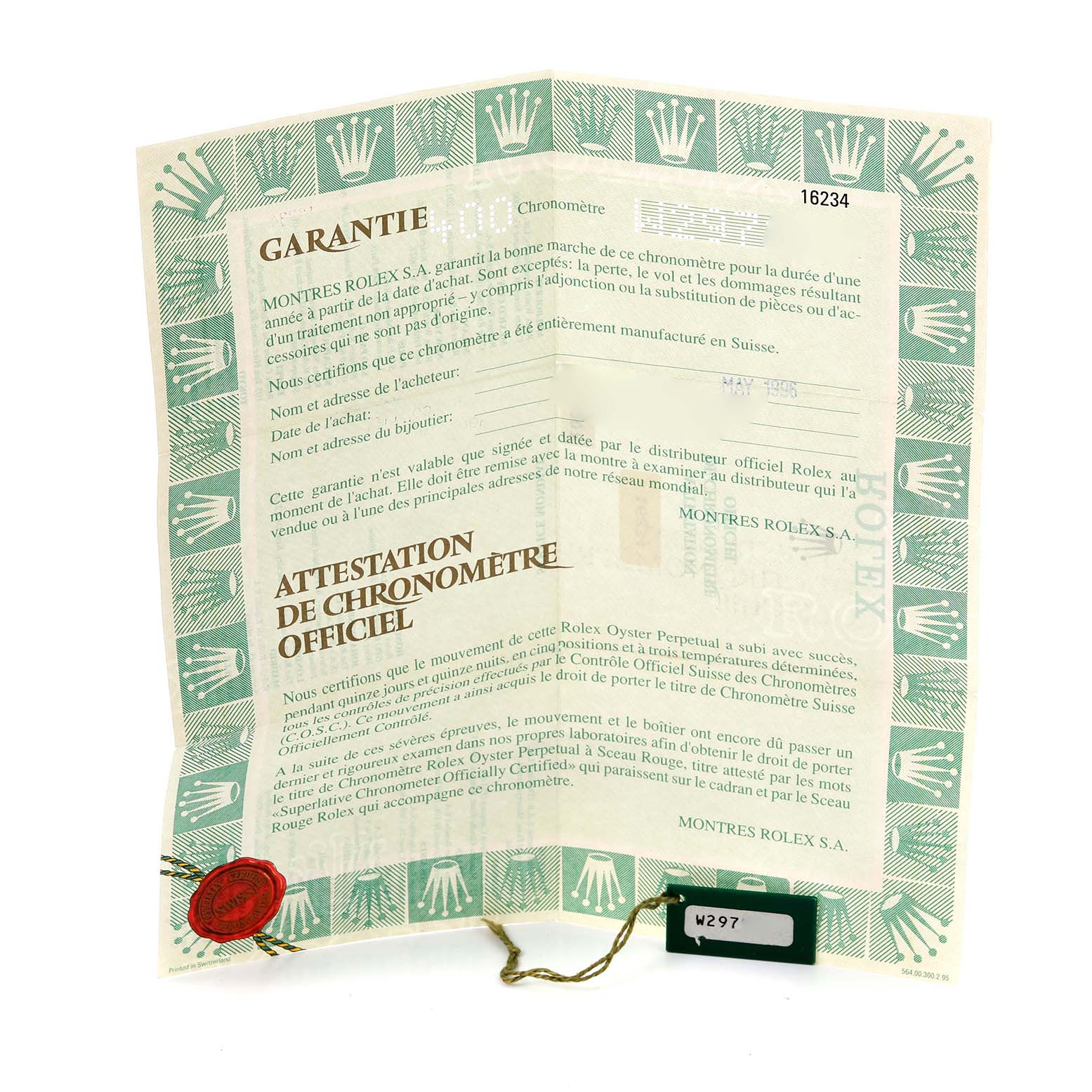 The image shows a Rolex Datejust 16234 Men's Stainless Steel Blue Dial 16234 Men's Stainless Steel Blue Dial warranty certificate angled slightly open with a green border and red seal.