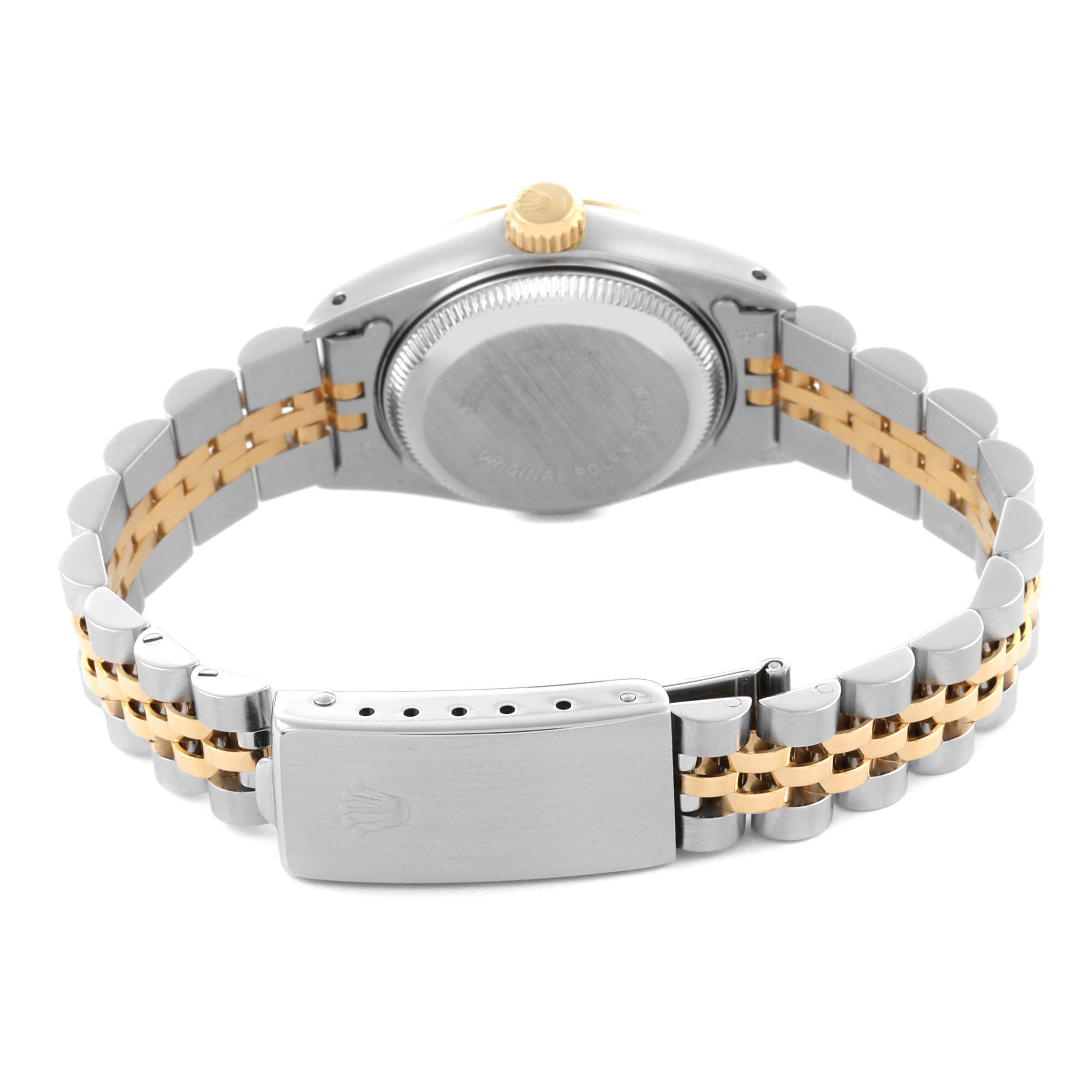 The Rolex Datejust 69173 Women's Steel and Gold (two tone) Black Dial 69173 Women's Steel and Gold (two tone) Black Dial watch is shown from the back, highlighting the case back, crown, and two-tone bracelet.