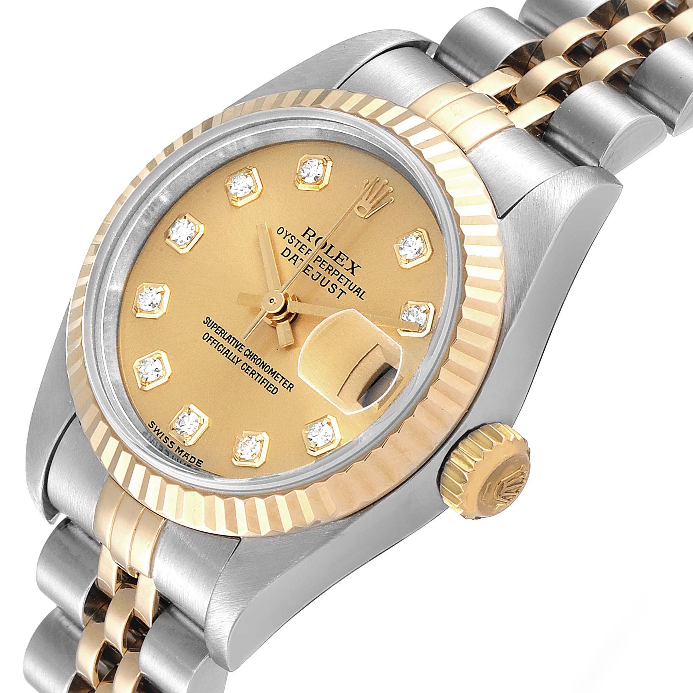 The image shows a Rolex Datejust 79173 Women's Steel and Gold (two tone) Champagne Dial 79173 Women's Steel and Gold (two tone) Champagne Dial watch from an angled close-up view, highlighting the dial, bezel, and part of the bracelet.