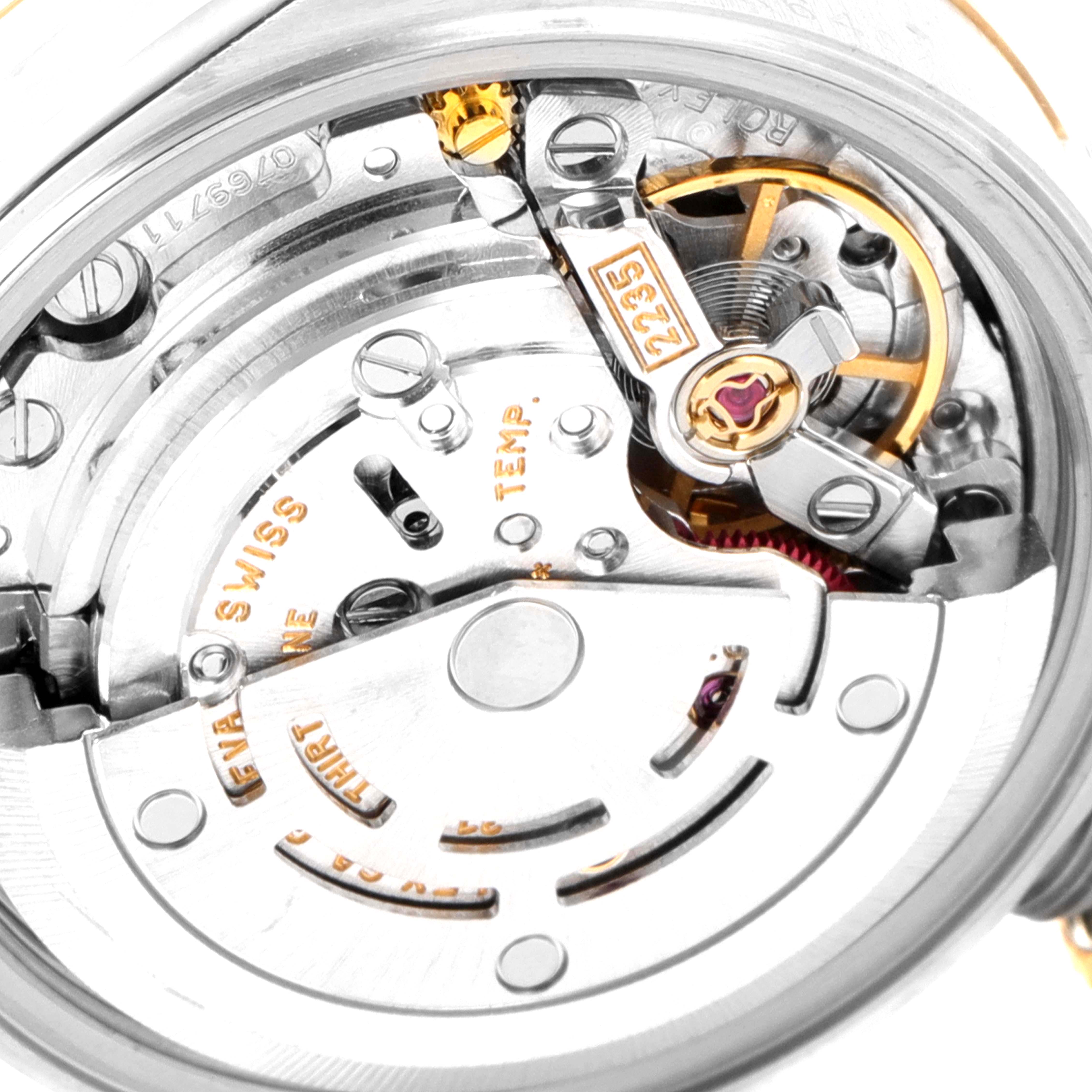 This image shows the intricate movement mechanism and inner workings of the Rolex Datejust 79173 Women's Steel and Gold (two tone) Champagne Dial 79173 Women's Steel and Gold (two tone) Champagne Dial watch from the back angle.